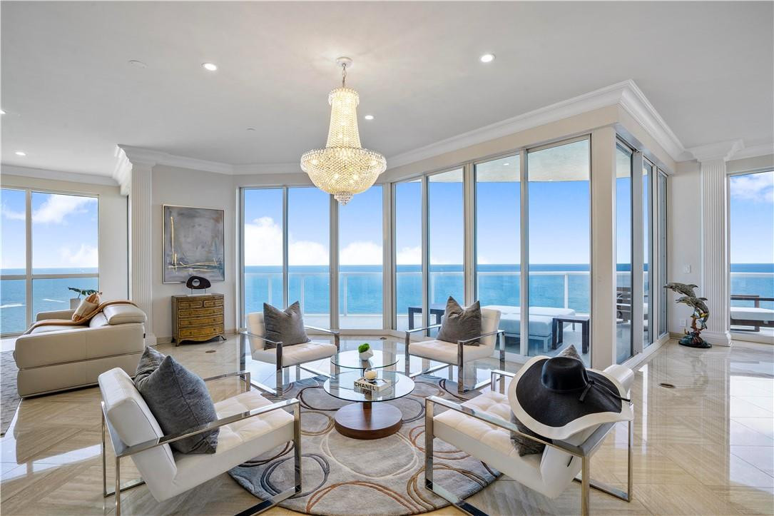 ONE OF A KIND TOP FLOOR PENTHOUSE RESIDENCE COMPLETELY REMODELED WITH UPDATED KITCHEN, BATHROOMS & MORE!! THIS EXCLUSIVE PH RESIDENCE OFFERS PANORAMIC OCEAN VIEWS FROM EVERY ROOM! HIGH CEILINGS ALLOW DRAMATIC OCEAN VIEWS FROM THE MOMENT YOU STEP IN FROM THE PRIVATE FOYER ENTRANCE. TOP FLOOR PENTHOUSE RESIDENCE IS SURROUNDED IN ALL GLASS & ELEGANTLY DECORATED WITH ALL CUSTOM FINISHES. LOCATED AT L'HERMITAGE TOWER TWO RIGHT ON THE SAND OF FORT LAUDERDALE BEACH OFFERING RESORT-LIKE AMENITIES. UNIT INCLUDES 2 PREMIUM ASSIGNED PARKING SPACES AND IS PRICED TO SELL!