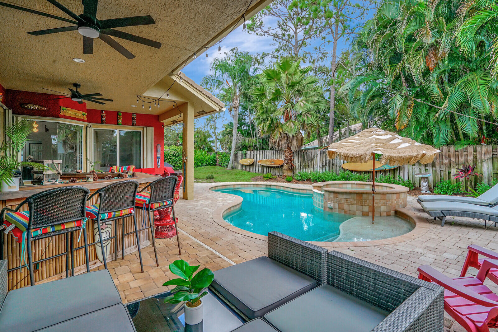 Gorgeous 4-bedroom, 3-bathroom FULLY FURNISHED HOME with a refreshing pool, nestled in the NON-HOA-FEE community of Sugar Pond Manor! This home boasts an exceptional floor plan, one of the finest in Wellington. Discover the thoughtfully designed split bedrooms, elegant formal dining room, and distinct living spaces. With ample room for the home, features a striking double-door entrance, lofty ceilings, tasteful crown molding, charming plantation shutters, and a luminous white kitchen complemented by stainless steel appliances. Host gatherings effortlessly and extend the festivities outdoors, where a heated pool, spa, well-appointed built-in bar, and numerous seating areas ensure the comfort of all. Beautiful place to call home!