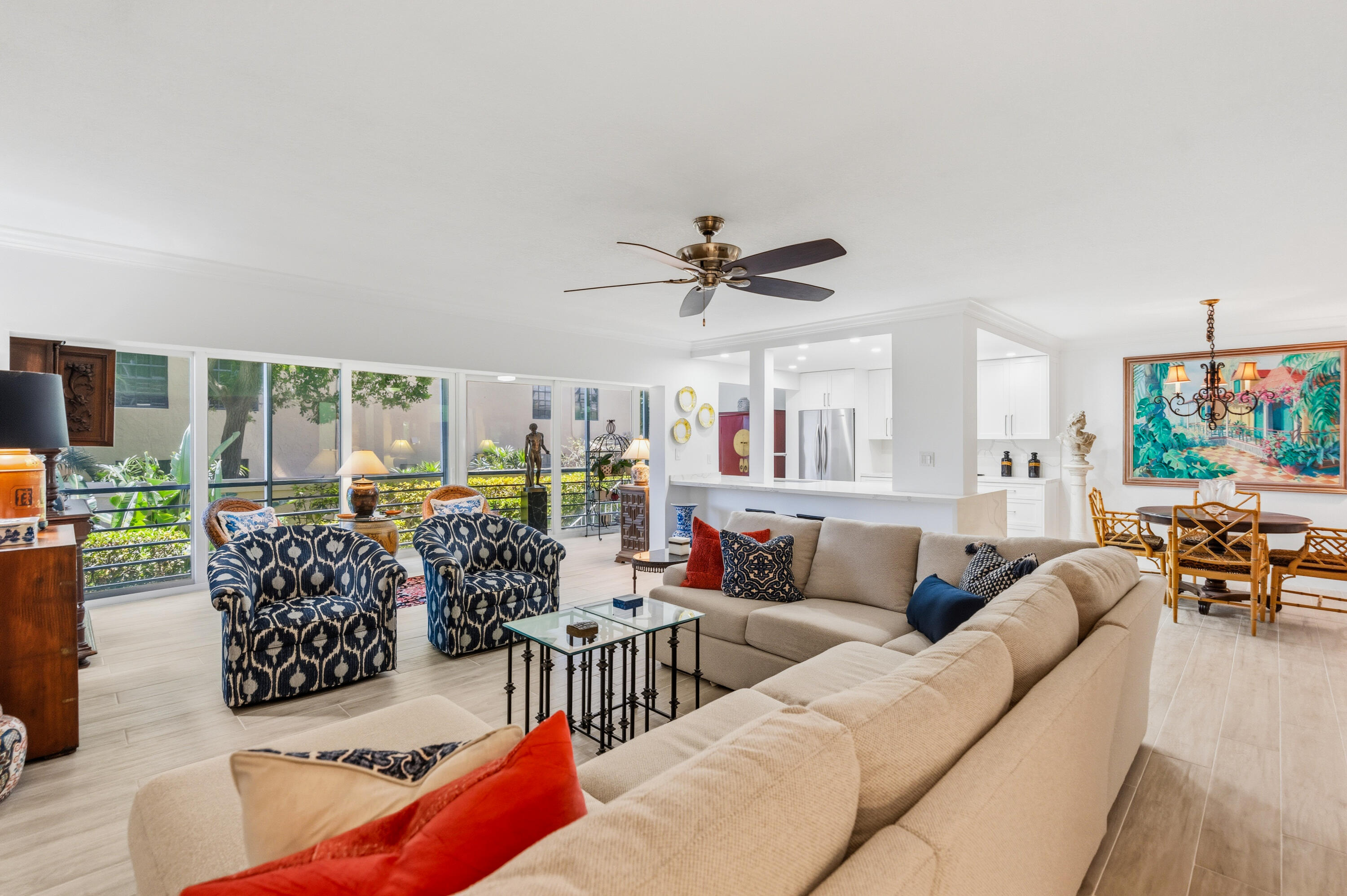 Welcome to this well-appointed waterfront 2-bedroom, 2-bathroom condominium located in the Winston House in Fort Lauderdale. Large impact sliding doors allow plenty of natural light into the living space and updated kitchen. This thoughtfully designed residence spans 1,481 square feet of finished living space, offering comfortable and functional layouts for modern living. The primary bedroom features an en-suite bath that flows to a generous walk-in closet, while the second bedroom provides flexibility for guests or a home office.  The unit offers the convenience of an in-unit washer and dryer. Premium location in Coral Ridge Country Club moments from the beach, restaurants and premier shopping.