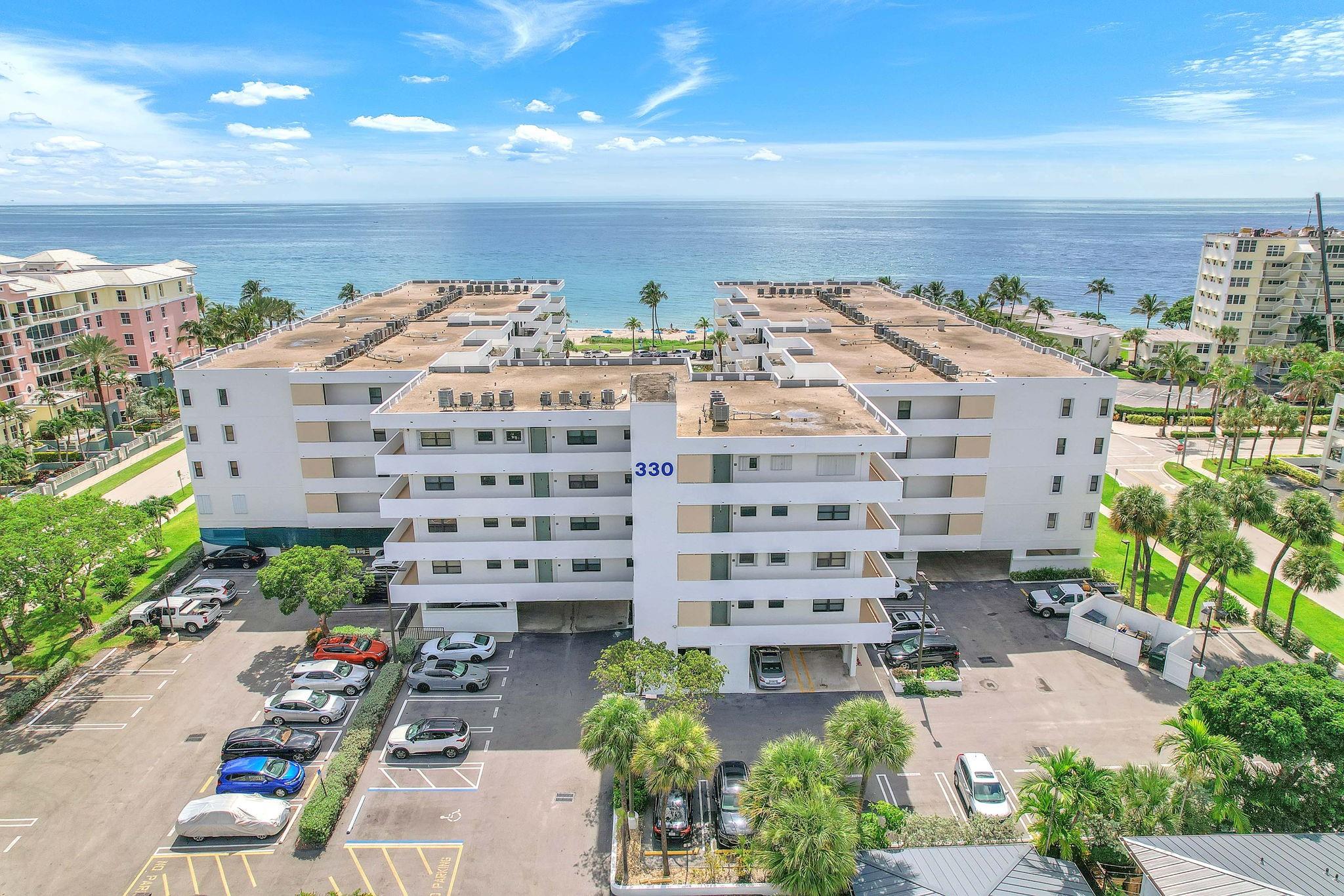 Beautiful 2 Beds, 2.5 Baths Beachfront Condo with Ocean View! Welcome to your coastal paradise in Deerfield Beach! This South-East corner penthouse offers stunning ocean views and has been fully renovated. The unit features impact windows and doors, ensuring both safety and tranquility. Inside, you'll love the open concept kitchen, complete with modern stainless-steel appliances. Walk out of the building, and you are just steps away from the sandy beach, vibrant restaurants, and fantastic shopping options. The perfect location for a beach lover and anyone seeking a vibrant coastal lifestyle. This condominium boasts a large heated pool with sun deck, spa, saunas, and much more...One covered parking very well located. Don't miss this chance to own your dream beachfront retreat!