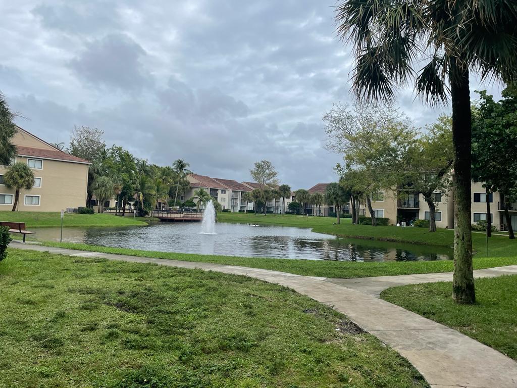 GREAT LOCATION AND  WELL KEPT COMMUNITY WITH DOUBLE GATE SECURITY ENTRANCE . JUST ACROSS THE CORAL SPRINGS MALL ENTRANCE AND OTHER SHOPPING CENTERS . WINDPROOF LIVING AND MASTER BEDROOM WINDOWS. GREAT SCHOOLS