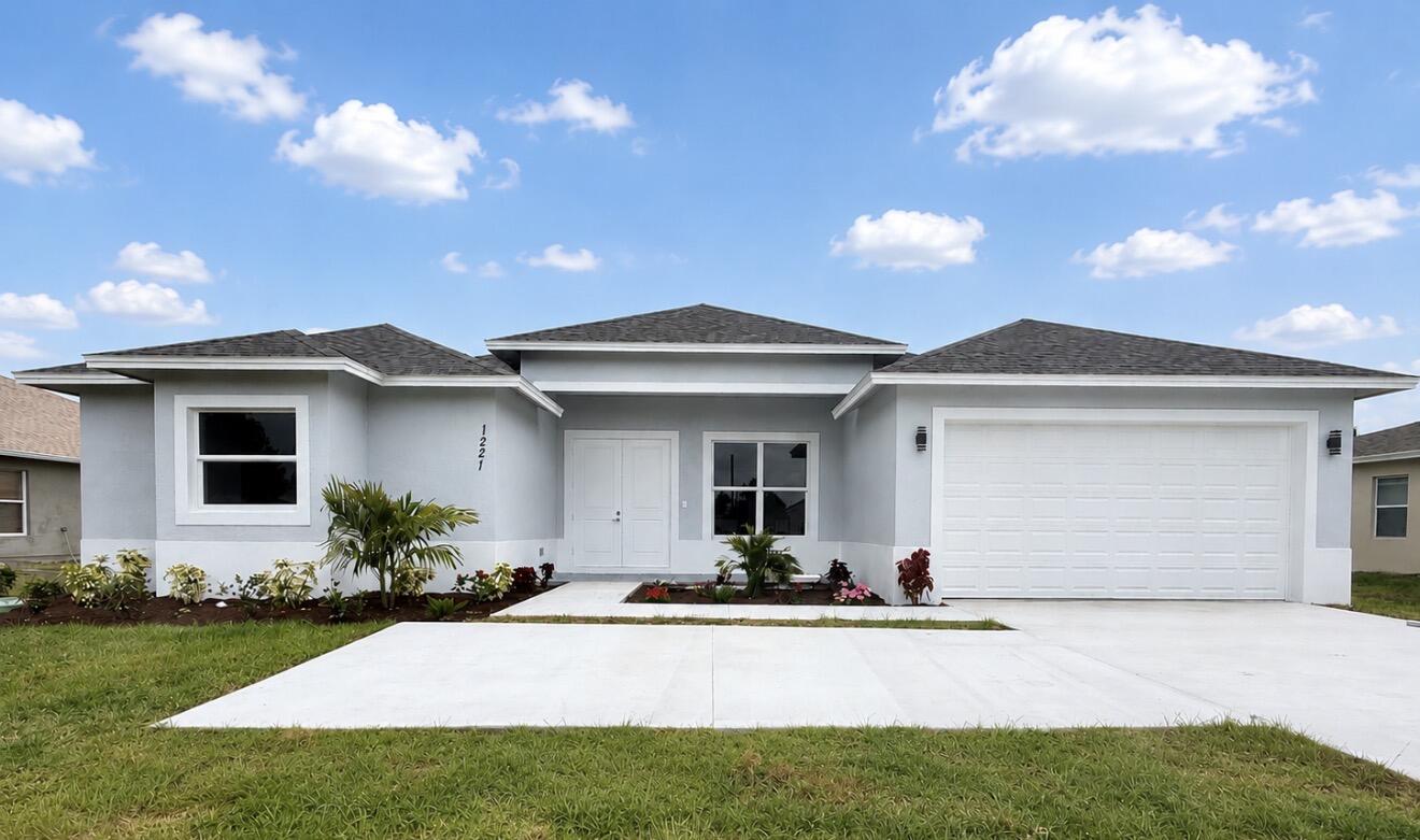 This beautifully crafted new construction home is the perfect blend of modern comfort and thoughtful design. Boasting 4 bedrooms and 3 bathrooms, this open concept, split floor plan home showcases a stunning kitchen with ample storage, quartz countertops, brand-new stainless-steel appliances, and a generous island ideal for casual meals or entertaining guests! Step outside to the large covered back porch, a serene spot to relax or entertain, rain or shine. Did I mention this home comes equipped with hurricane impact windows? So, no need to worry about those pesky shutters. Conveniently located, this home truly has it all!
