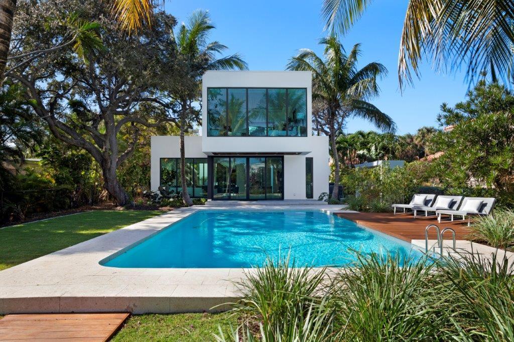 Nestled on a verdant waterfront 1/2-acre+ lot on serene Hypoluxo Island, this ultra chic house among the trees blurs the line between indoor/
outdoor living. Glass walls seamlessly connect open-plan interiors with lush exteriors. Four-bedroom, 2-story with a studio doubling as a 5th guest suite. Elevator, saline pool, summer kitchen, floating dock. 10 Miles from Palm Beach shopping, dining, airport. The information herein is deemed reliable and subject to errors, omissions or changes without notice. The information has been derived from architectural plans or county records. Buyer should verify all measurements. Buyer must pay Development fee of 1.5% of purchase price at closing. DISCLAIMER: Information published or otherwise provided by Premier Estate Properties, Inc. and its representatives including but not limited to prices, measurements, square footages, lot sizes, calculations and statistics are deemed reliable but are not guaranteed and are subject to errors, omissions or changes without notice. All such information should be independently verified by any prospective purchaser or seller. Parties should perform their own due diligence to verify such information prior to a sale or listing. Premier Estate Properties, Inc. expressly disclaims any warranty or representation regarding such information. Prices published are either list price, sold price, and/or last asking price. Premier Estate Properties, Inc. participates in the Multiple Listing Service and IDX. The properties published as listed and sold are not necessarily exclusive to Premier Estate Properties, Inc. and may be listed or have sold with other members of the Multiple Listing Service. Transactions where Premier Estate Properties, Inc. represented both buyers and sellers are calculated as two sales. Premier Estate Properties, Inc.'s marketplace is all of the following: Vero Beach, Town of Orchid, Indian River Shores, Town of Palm Beach, West Palm Beach, Manalapan Beach, Point Manalapan, Hypoluxo Island, Ocean Ridge, Gulf Stream, Delray Beach, Highland Beach, Boca Raton, East Deerfield Beach, Hillsboro Beach, Hillsboro Shores, East Pompano Beach, Lighthouse Point, Sea Ranch Lakes and Fort Lauderdale. Cooperating Brokers are advised that in the event of a Buyer default, no commission will be paid to a cooperating Broker on the Deposits retained by the Seller. No commissions are paid to any cooperating broker until title passes or upon actual commencement of a lease. Some affiliations may not be applicable to certain geographic areas. If your property is currently listed with another broker, please disregard any solicitation for services. Copyright 2020 Premier Estate Properties, Inc. All Rights Reserved.

DISCLAIMER:  Builder and/or Seller reserve the right to make changes and/or modifications to plans, specifications, features, colors and prices.  All plans and elevation renderings shown are artists' conceptions and are not to scale.  The information herein is believed to accurate but not guaranteed and may be subject to errors, omissions and changes without notice.  All measurements, dimensions, room sizes and lot sizes are approximate.