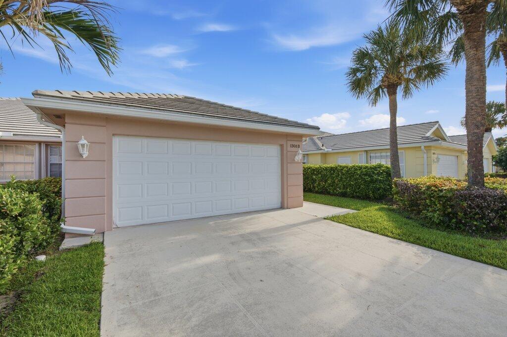 Welcome to this charming 2 bedroom, 2 bath, 2 car garage villa in the Lakes at St Lucie West. This stunning lot overlooks the lake, and as soon as you walk in, you are greeted with endless possibilities of making this gorgeous layout your forever home. The Outdoor Screened patio is surrounded by natural beauty - with the primary bedroom offering dual sinks and under lighting. The split floor plan offers comfort and relaxation. With 1525 living square feet, it is perfect space to entertain. Schedule your showing today!