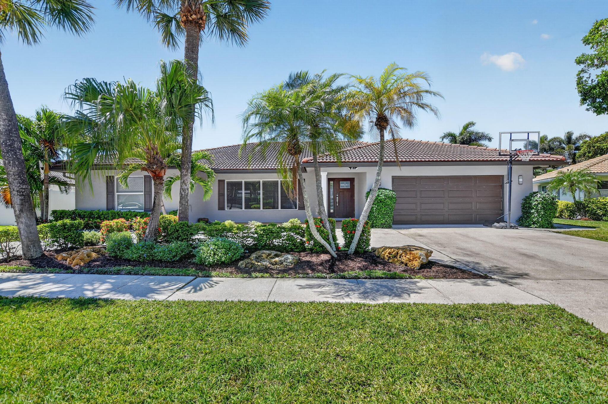 Renovated one-story, 4-bedroom home in the desirable Carriage Hill community of East Boca! Zoned for Addison Mizner, one of the top rated elementary and middle schools in Palm Beach county. Private master suite with double vanity and spacious walk-in shower. Open kitchen with stainless steel appliances, large island, double ovens, and separate pantry. Perfect for indoor-outdoor living and entertaining. Southwest exposure in the backyard, with lawn space, screened-in patio area and heated pool. Ideally situated minutes from downtown Boca and the beaches, & walking distance to 2 parks w/pickleball, tennis, playground & more!