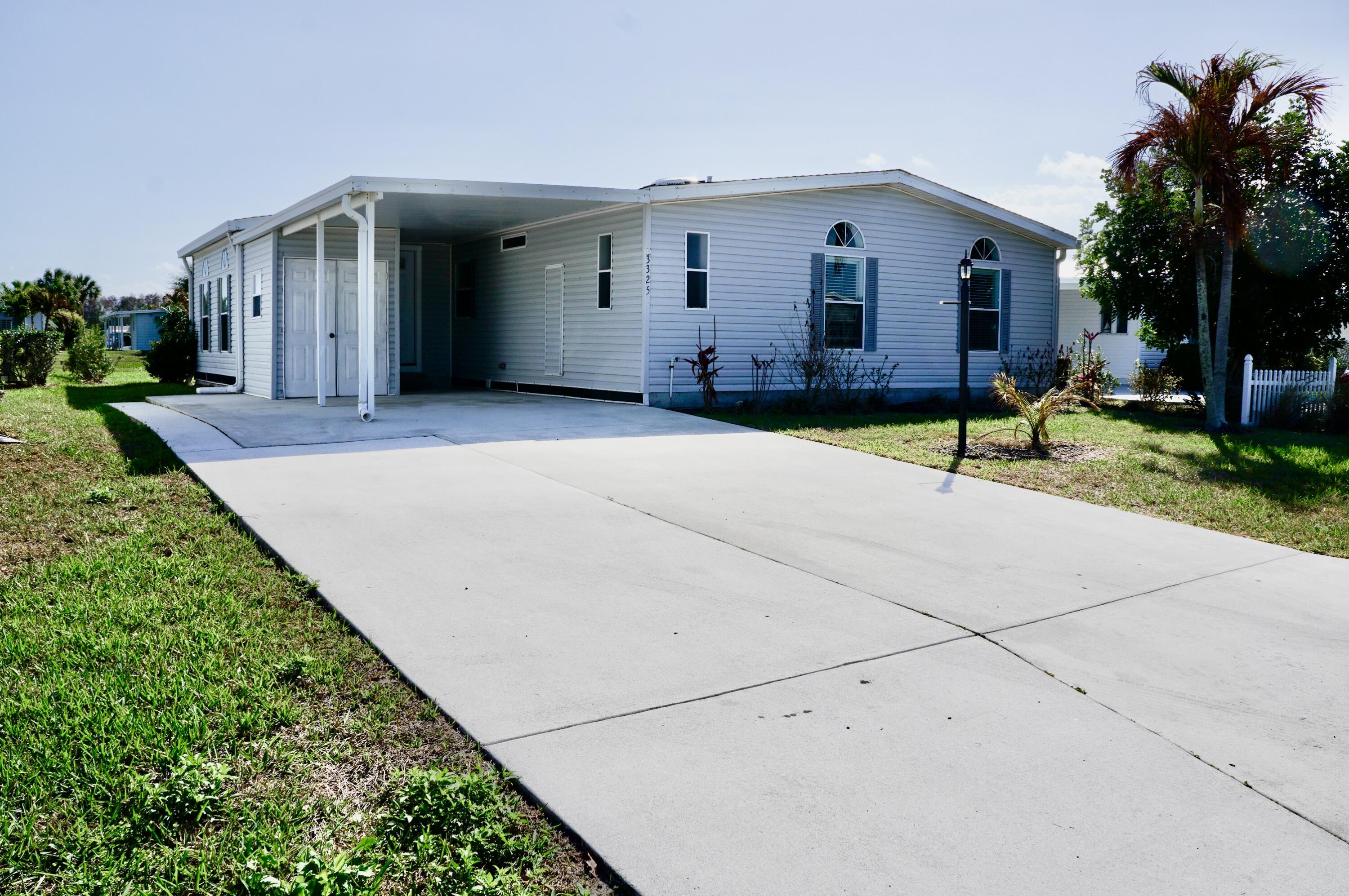 WATERFRONT! Huge EXTRA ROOM/DEN with beautiful water view. Also a HUGE 23x14 Glass Florida Room Overlooking Water.  Interior Paint. New Kitchen Tile Flooring and Brand New Carpet throughout home. 2 Bedrooms; 2 Bathrooms, Large Living Room and Spacious Office/Den. Inside Laundry Room. Attached Shed for Tools and Pool Floats.  Plenty of Space to Entertain Friends and Family. Don't miss this chance to have a Waterfront Home in Florida's highly desired Savanna Club. Experience the best of 55+ living with resort style amenities featuring staffed clubhouses, fitness center, 3 swimming pools, tennis, pickle ball, 10,000sf theater, 18 hole golf course, restaurant, etc. Take time to relax or stay busy with the community social calendar. Call today for your private tour!