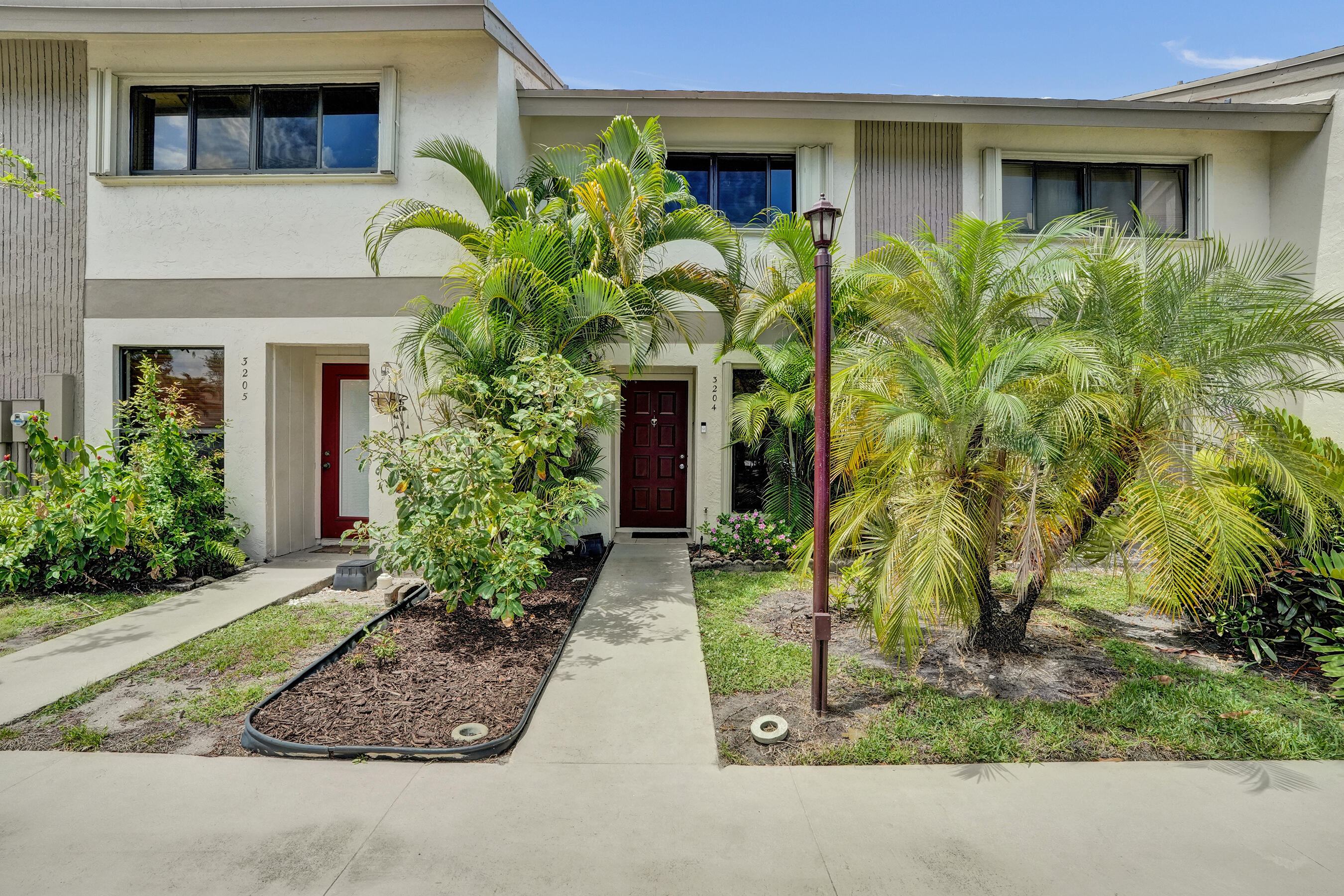 Seller Motivated!  Gated Pines West Community in Oakland Forest. Luxurious  2 bedroom  1 1/2 bath townhome.  The updated  kitchen features stainless steel appliances, ceramic floors downstairs, large living/dining room & open private garden patio perfect for BBQ's entertaining or relaxing. Upstairs feature  bathroom & wall to wall custom closets, laminate floors, vaulted ceilings,  with washer /dryer. All windows & slider feature accordion shutters for hurricane protection, central AC is 4, roof is 9 years old. Pines West is impeccably maintained, low HOA fees, w/ full reserves, hi-speed internet, cable master insurance, sewer, garbage, heated just refurbished pool & fitness center included. Pets welcome. Per HOA: 650+ credit 10% down