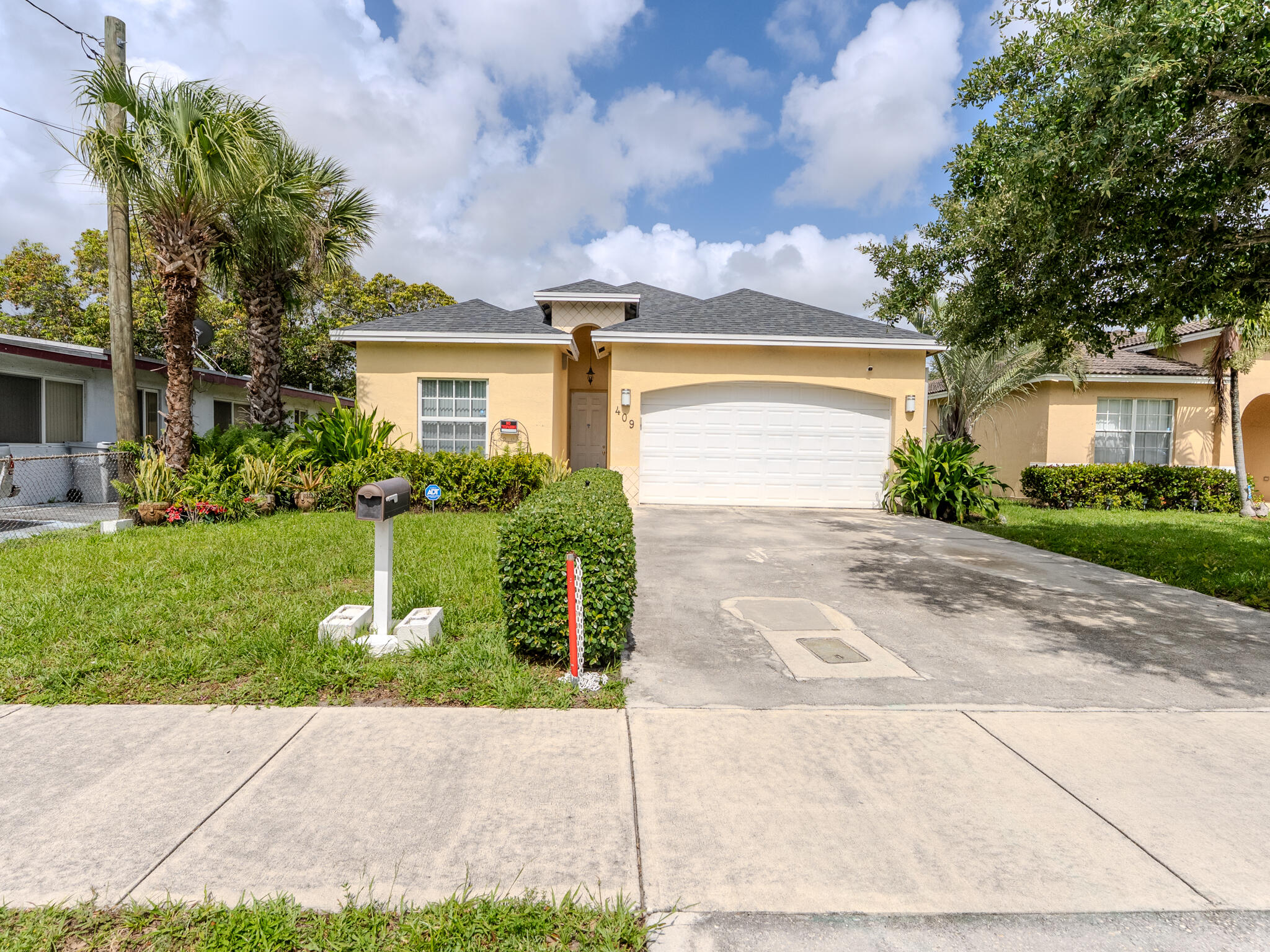 Incredible opportunity to own a beautiful, turn-key 3-bedroom, 2-bathroom single-family home in the heart of Pompano Beach! Built in 2005 and boasting a spacious layout with 1,650+ sq ft of under-air living space, this home is designed for modern living. The heart of the home features a beautifully updated kitchen equipped with gorgeous countertops and ample cabinetry. Retreat to a humongous master suite featuring a massive walk-in closet and striking double doors that open directly to the backyard—creating the ultimate setup for indoor-outdoor entertaining. Perfectly positioned for commuters, you are just minutes from I-95 and the Florida Turnpike for seamless travel. Enjoy living close to the vibrant, newly redeveloped Pompano Beach oceanfront, local dining, shopping, and parks. No HOA