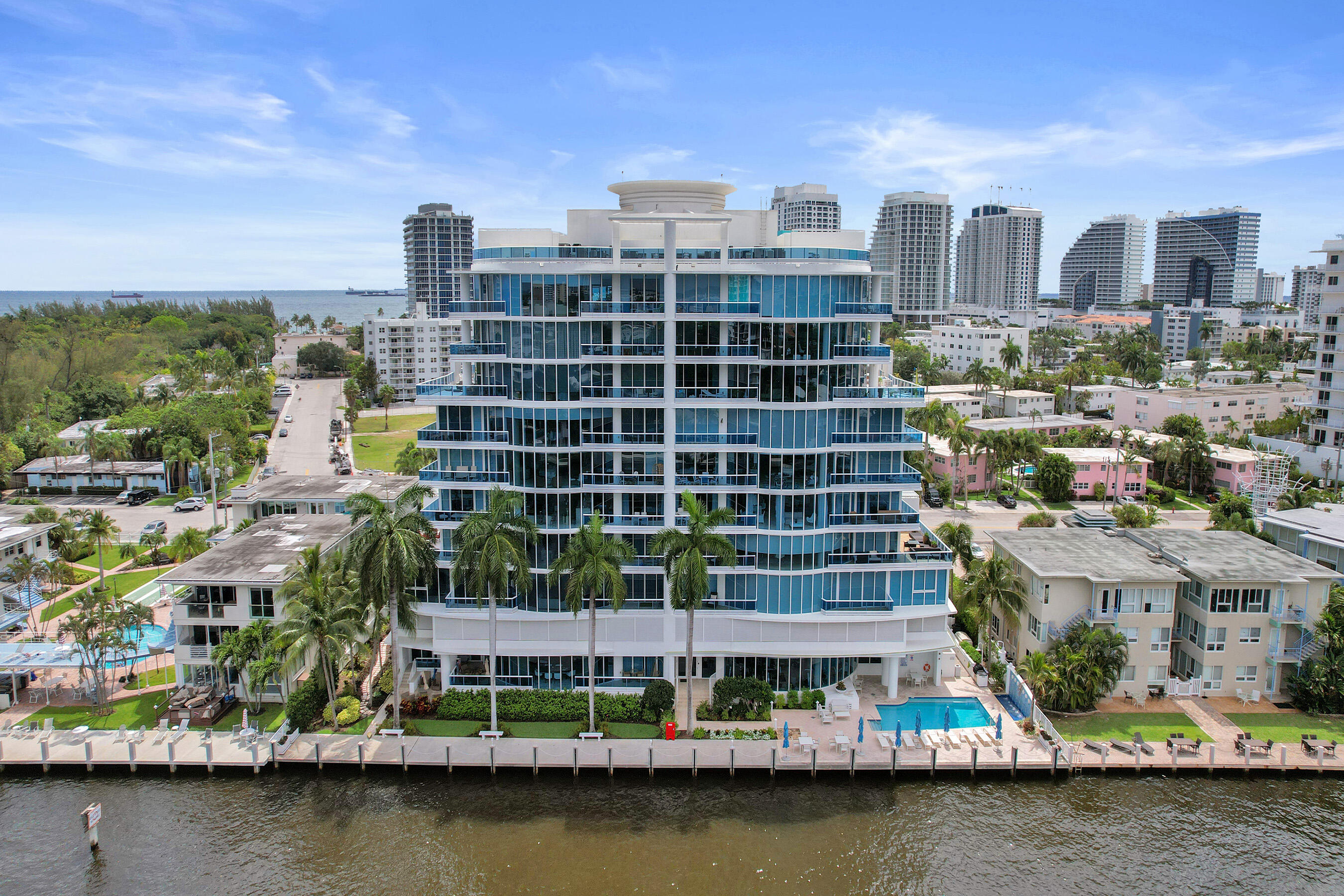 Rarely Available West View Unit! Experience the height of waterfront luxury in this stunning 9th-floor residence at LaRive, an exclusive boutique building in the Central Beach enclave of East Ft. Lauderdale.  This light-filled 3-bedroom plus den 3.5-bathroom retreat combines sophistication with comfort. Enjoy the ultimate sense of arrival with private elevator access into your home. The expansive 3417 sq. ft, open-concept living space is framed by a magnificent curved wall of floor-to-ceiling windows, showcasing breathtaking, wide-angle views of the Intracoastal and the vibrant Fort Lauderdale skyline.  Updated contemporary finishes throughout. This move-in-ready residence offers a rare opportunity to live in one of the area's most impeccably managed and maintained waterfront communities. Situated on the beach front barrier island, between the Atlantic Ocean to the east and the Intracoastal Waterway to the west, this is a premier waterfront location within the hidden gem neighborhood of Central Beach.   Luxury living, high end hotels and award winning restaurants intermingled with the quaint touches of small cafes and shops along Breakers Avenue.   Notable Neighborhood Features: high walkability to beaches, dining, and shops, the Bonnet House Museum and Hugh Taylor Birch State Park along Fort Lauderdale Beach Boulevard. State of the art boat marina is just up the road.  Situated conveniently between the Sunrise and Las Olas bridges, making mainland access to markets, shops, restaurants, pickleball and tennis a breeze. Building features: Residents of La Rive enjoy close to 200 feet on the wide waterway allowing for boat drop off and pick up as well as Water Taxi service. Amenities abound: waterfront heated pool, well-equipped fitness center overlooking the pool and waterfront, sauna, steam room, outdoor BBQ grill, covered patio, community entertainment room, secured entry, 24 hour manned lobby, covered parking garage with 2 designated spots, A/C controlled storage unit. Pet-friendly building.    Enjoy unbelievable waterway views and a parade of boats by day, stunning sunsets and sparkling skyline by night. Perfect as a seasonal retreat or a full-time residence, this turn-key condo is ready to welcome you home.  **Whole unit water filtration system is excluded from the sale.