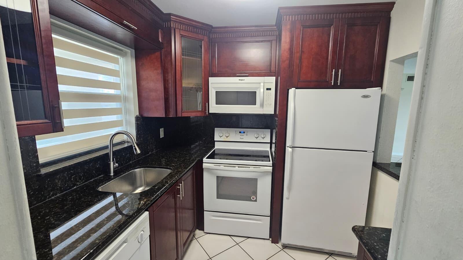 All ages welcome! Investors welcome! Rent right away! This beautifully maintained 2-bedroom, 2-bathroom condo offers comfort, convenience, and an unbeatable location. Situated near top-rated A schools and just minutes from shopping, dining, healthcare facilities, and everyday essentials including Publix, Walgreens, CVS, BJ's, Walmart, banks, and more. Whether you're a first-time homebuyer, seasonal resident, or investor, this property presents an excellent opportunity. Additional storage space provides practical convenience, and the unit includes one assigned parking space plus a guest parking pass.
