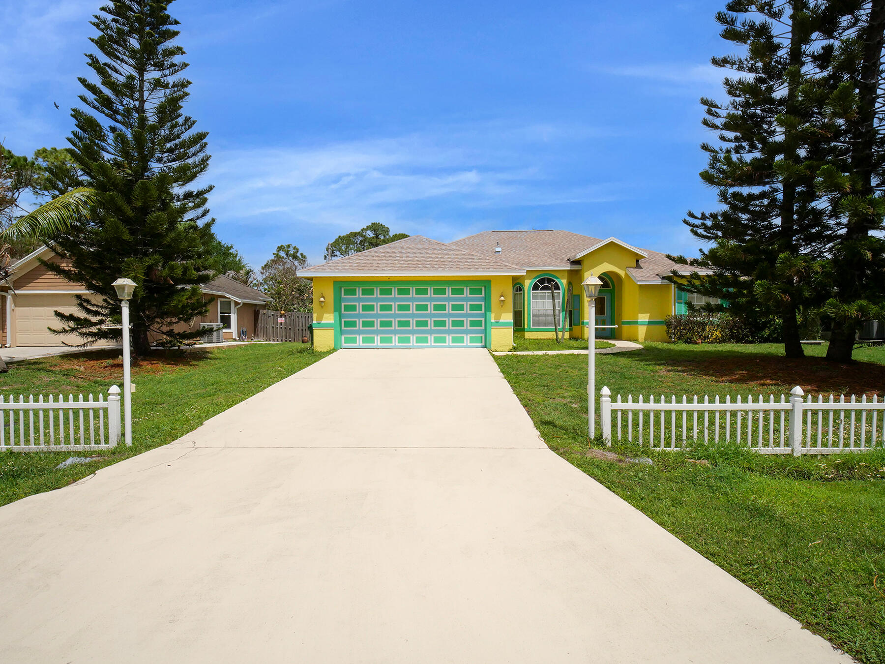 Spacious 4-bedroom, 2-bathroom home with a 2-car garage located in the heart of Port Saint Lucie! Built in 2005 and offering 2,224 living square feet, this home features high ceilings and a bright, open layout with plenty of room for both relaxing and entertaining. Enjoy peace of mind with a NEW roof, NEW A/C, and NEW water heater—big-ticket items already taken care of. The home offers a solid foundation and is well-maintained, with an interior that provides a great opportunity to personalize and make your own over time. Conveniently located near shopping, dining, and major roadways, this property is perfect for buyers seeking space, comfort, and long-term value. Don't miss your chance to own a move-in ready home with tons of potential!