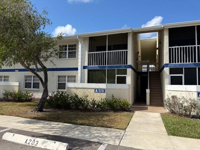 This 2-bedroom, 2-bath condominium offers not just a home, but also a vibrant lifestyle. Its prime location is within walking distance of St. Lucie Hospital, the Cleveland Clinic, and various medical offices, making it ideal for healthcare professionals. You'll also find a diverse range of shopping, dining, and entertainment options nearby. Enjoy the convenience of having a washer and dryer right in your unit. Don't miss out on this incredible opportunity! See attachments