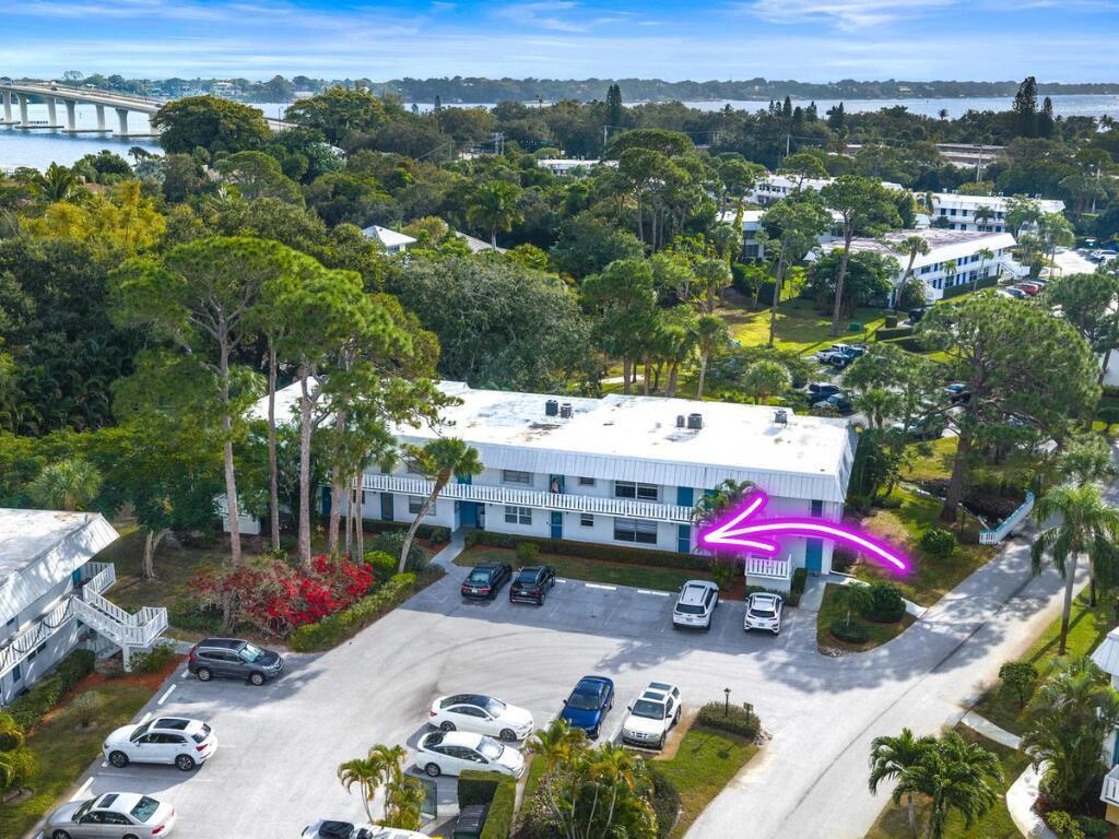 Welcome to easy, carefree living in this highly desirable first-floor condo located in Cedar Pointe Village, a well-established and desirable 55+ community in the heart of Stuart. The rare ground-level location with no stairs offers unmatched convenience and accessibility—perfect for comfortable everyday living or a stress-free seasonal retreat. Inside, the residence is filled with natural light and features a thoughtfully designed layout with tile flooring throughout, creating a clean, cohesive, and low-maintenance space that suits Florida's relaxed coastal lifestyle. The inviting living areas flow effortlessly, making the home feel open, welcoming, and easy to enjoy. Cedar Pointe Village is known for its beautifully maintained grounds and vibrant yet peaceful atmosphere.  Residents enjoy resort-style amenities including a sparkling community pool, clubhouse, shuffleboard, common laundry facilities, and on-site management, fostering both convenience and a true sense of community.  The monthly maintenance fee enhances the carefree lifestyle by covering cable, roof maintenance, lawn care, parking, trash removal, laundry facilities, and common areas, allowing you to spend more time enjoying life and less time worrying about upkeep.  Ideally located just minutes from downtown Stuart, local beaches, dining, shopping, and medical facilities, this home offers the perfect blend of location, comfort, and lifestyle. Whether you're downsizing, seeking a winter escape, or looking for a low-maintenance primary residence, this first-floor opportunity delivers exceptional value in one of Stuart's most convenient 55+ communities.
