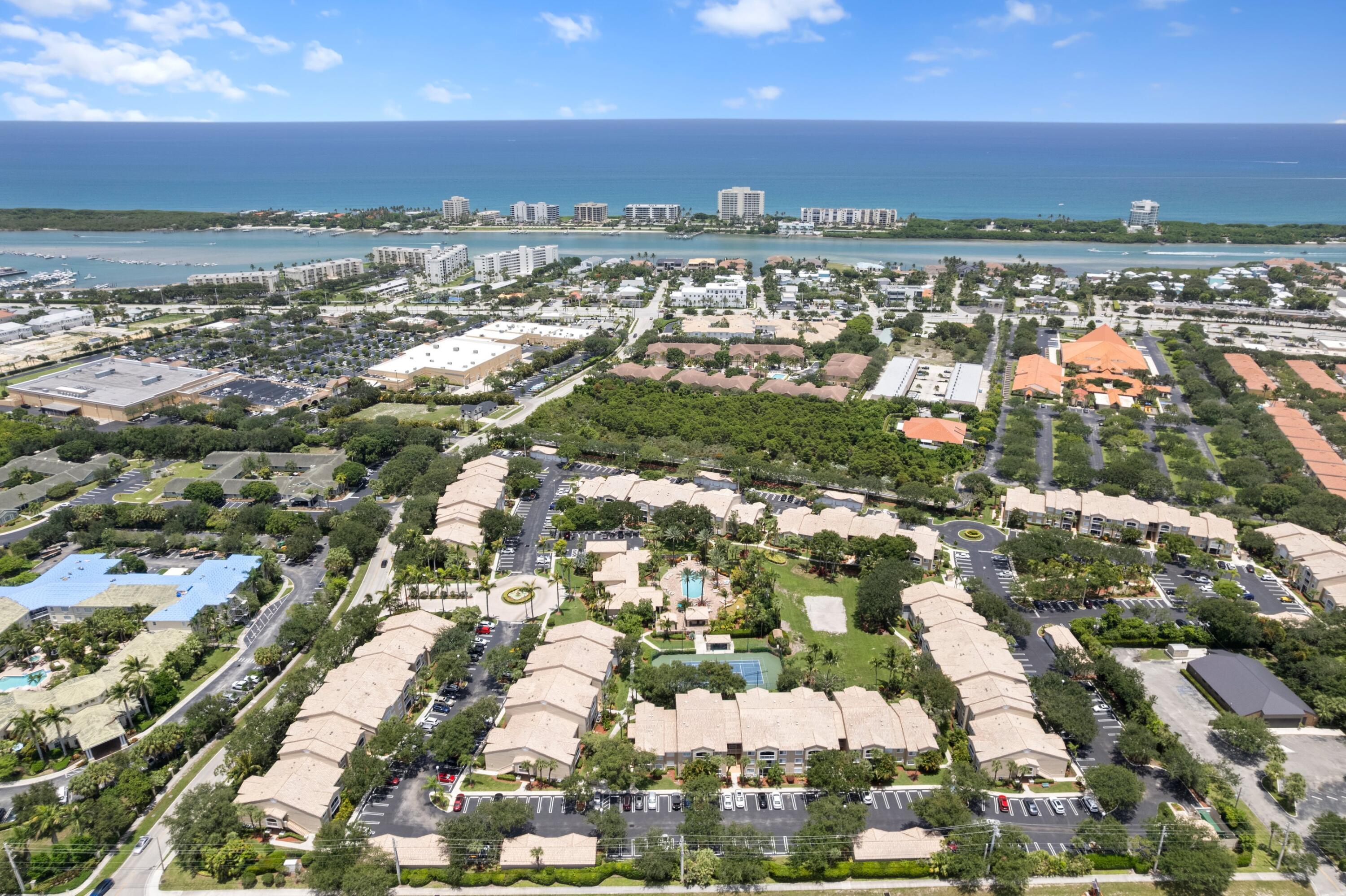 Rare garage opportunity in Lighthouse Cove. Beautifully appointed ground floor 2 bedroom, 2 bathroom condo in the heart of Tequesta, offered fully turnkey and move in ready. This inviting residence features a screened in patio, comfortable living spaces, and an easy ground floor location ideal for enjoying the South Florida lifestyle.  A standout feature is the opportunity to purchase an oversized private 1 car garage located directly across from the unit for an additional $40,000 through a separate purchase agreement. Private garages are extremely rare in Lighthouse Cove and offer valuable convenience, storage, and protection.  Residents enjoy resort style amenities including a heated saltwater pool, 3 barbecue  areas, fitness center, business center, billiards room, handball  handball court, tennis, pickleball, and beach volleyball, all within one of Tequesta's most desirable condo communities.