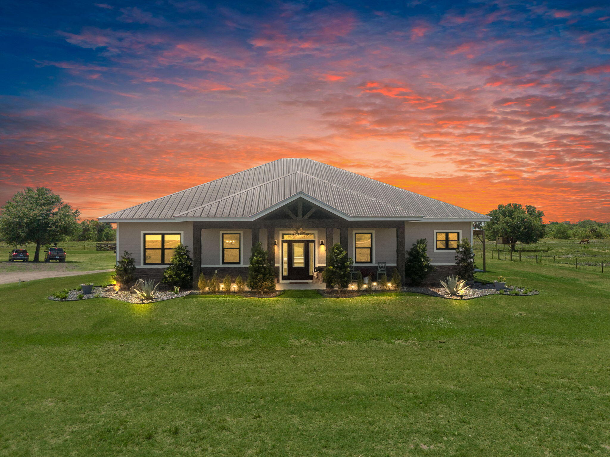 Rare 35.8-Acre Legacy Estate & Custom Pool Home - AG-5 Zoning
Escape to your private oasis in the heart of the Florida countryside! This impeccably designed 2,400+ sq. ft. pool home offers the ultimate blend of modern luxury and rural freedom. Built with resilience in mind, the residence features full impact windows/doors and spray-foam insulation for maximum efficiency.
For the hobbyist or professional, the property boasts a massive 50x60 hurricane-rated workshop (14-ft eaves) with a partially finished apartment, commercial LiftMaster gates, and 3 RV hookups. The land is cleared, leveled, and ready for your agricultural vision—featuring cattle pens and a concrete pig pen already in place. Bring your horses, cattle, and livestock to this peaceful retreat, just 25 Minutes to the Beach, but miles from city noise - the best of both worlds! Whether you're raising livestock, seeking peaceful country living, or envisioning a multi-home family retreat, this property is a rare find.