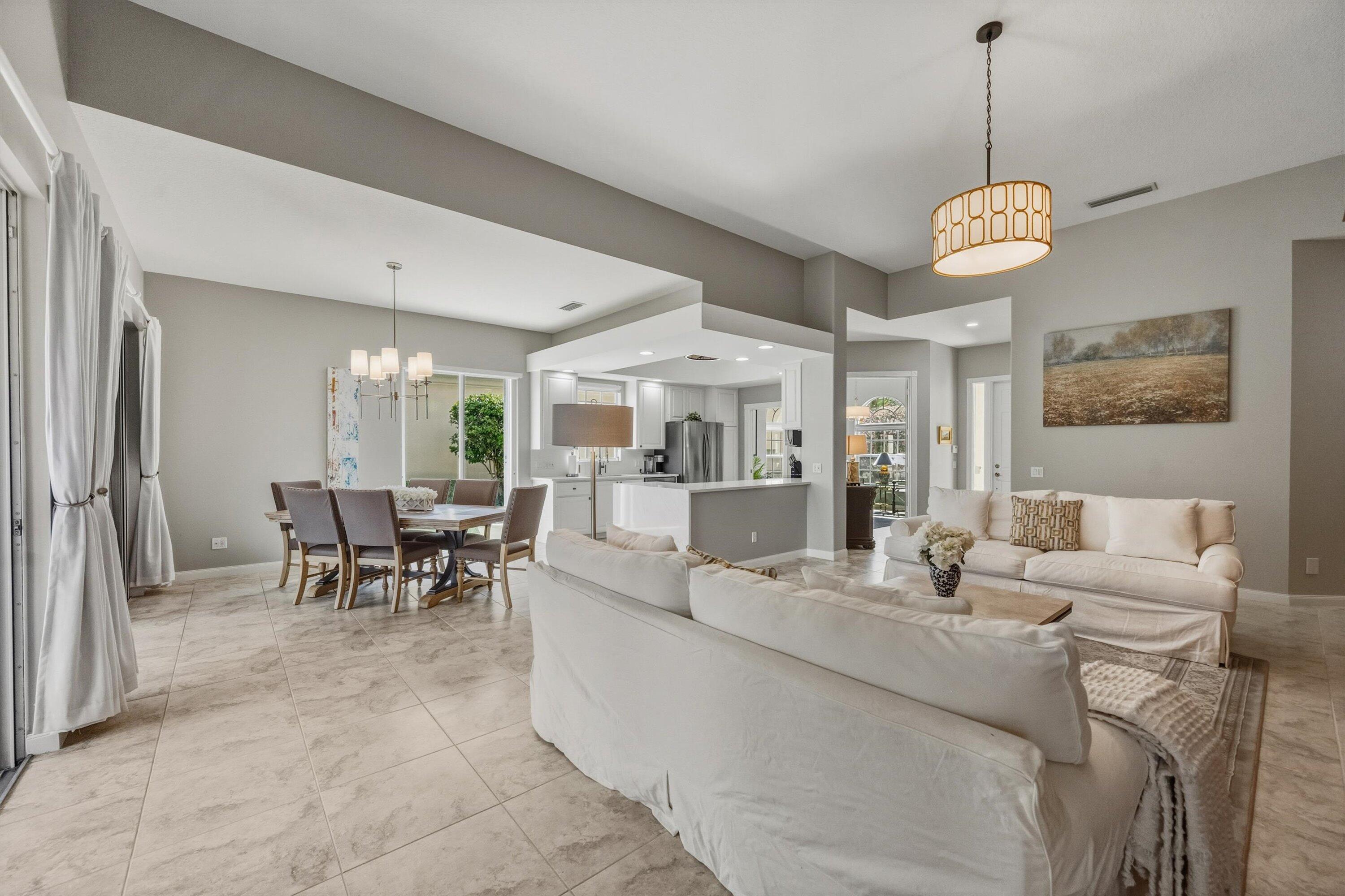 Welcome to this stunning waterfront single-story residence in VillageWalk of Wellington  offering 2,199 square feet of refined living space. This three-bedroom, and two and half bathroom home features thoughtful design with direct access to the community's waterfront setting. The open floor plan maximizes comfort and functionality across the well-appointed interior, while the two-car garage provides convenient parking and storage. Located in the desirable VillageWalk of Wellington 4 community in Wellington, Florida, this waterfront property presents an exceptional opportunity for those seeking a sophisticated and connected living experience. Be the first to enjoy owners renovations. This is  a wonderful home to spend the winter months or the entire year with all that Wellington has to  offer including the International WInter Equestrian festival, great restaurants, shopping, hospitals and schools.