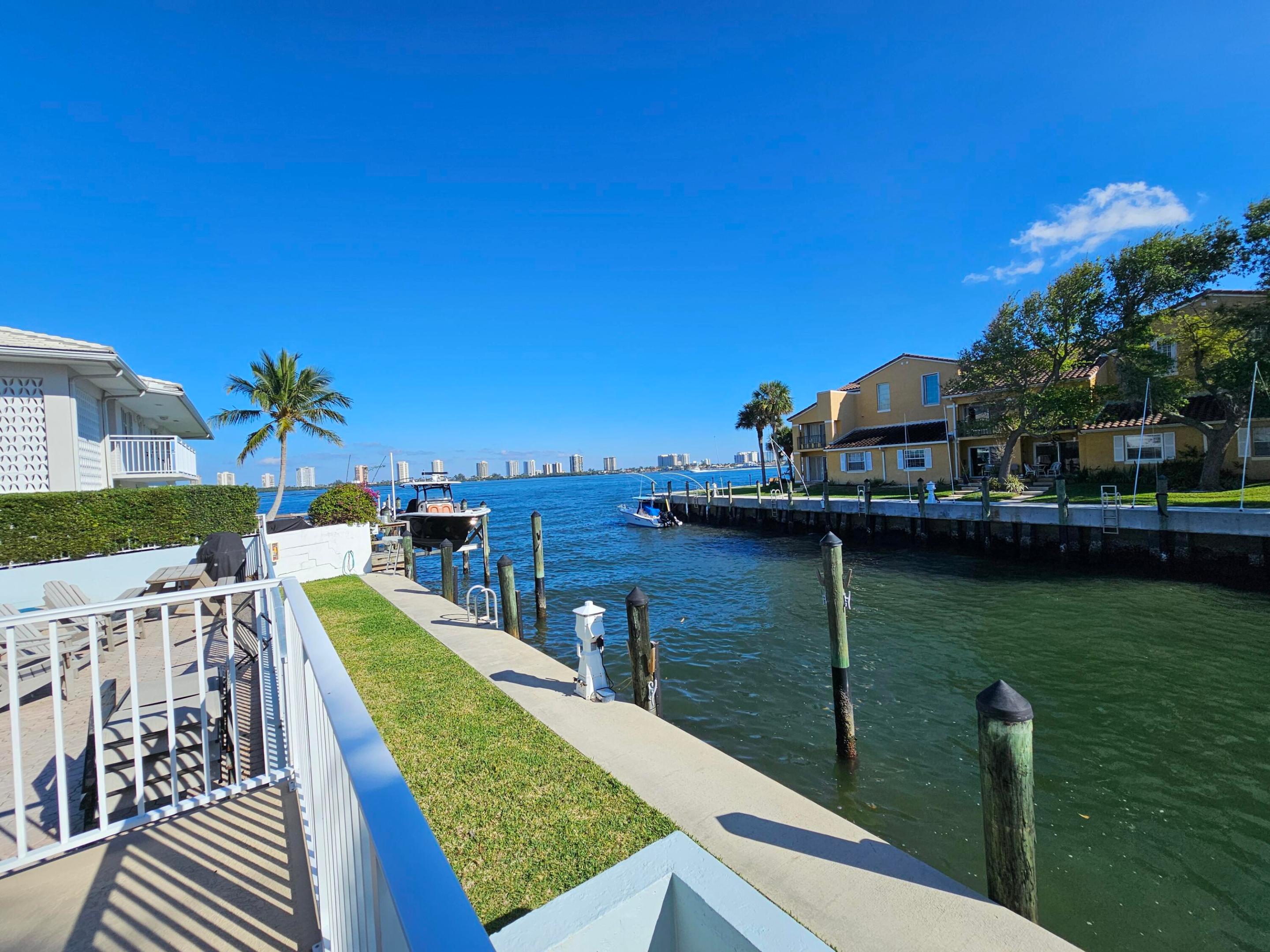 1ST FLOOR,  WATERFRONT! Relax at the pool overlooking the Intra-coastal waterway. Association offers rental boat slips for occupying owners at $3/ft up to 33'. Super clean 1 bedroom  with A/C  new  (11/25) Water heater & appliances two years old. Step outside your covered, screened patio to seawall & boat to cruise thru intra-coastal to the ocean. Incredible location.