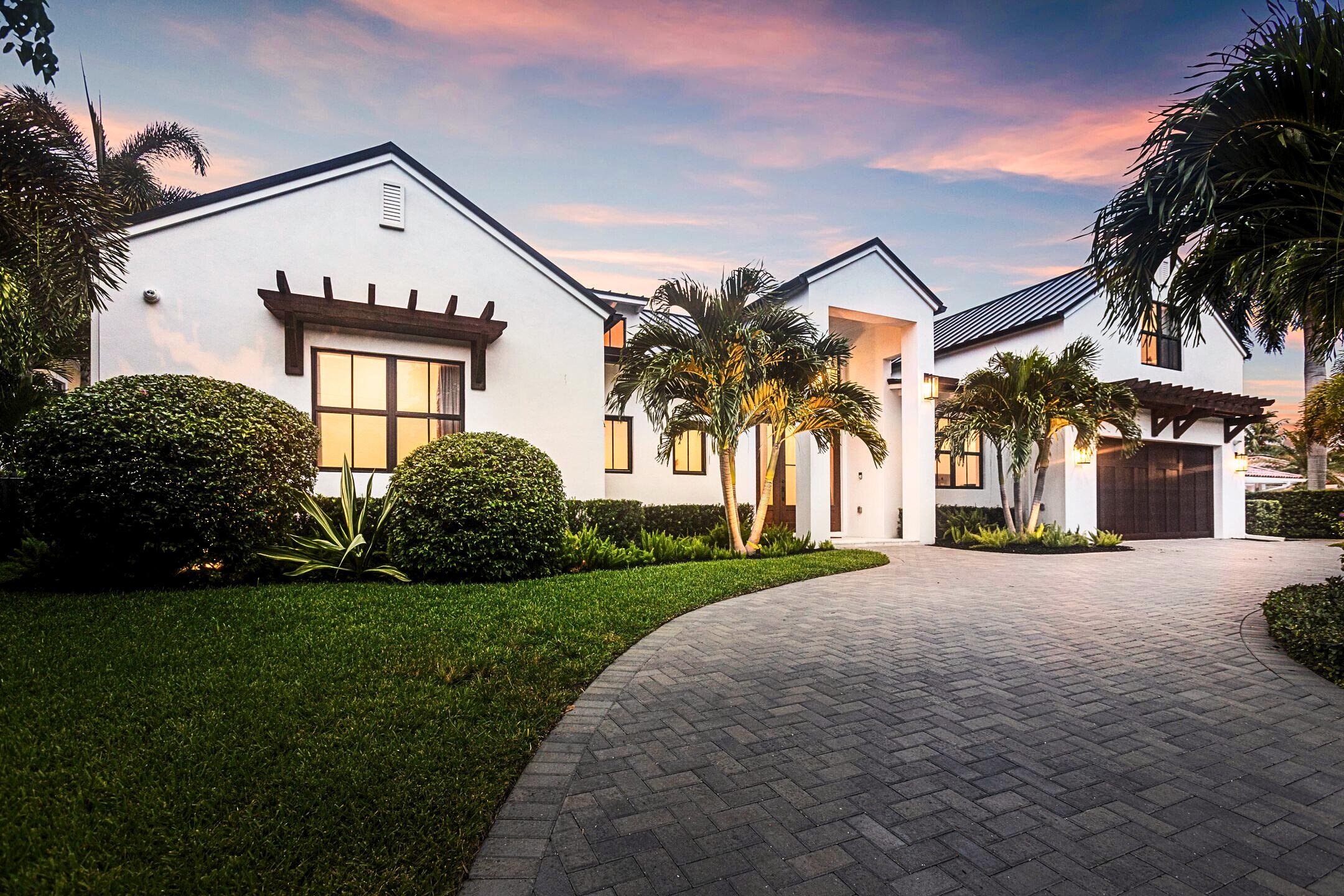 Where modern luxury meets effortless navigation, 1110 Fairview Lane is an unrivaled sanctuary for the yachting lifestyle. A newly built waterfront estate that redefines modern coastal living on Singer Island. Completed in 2022, this 6-bed, 4.5-bath residence encompasses 4,472 sq. ft. under air and 5,700 total sq. ft. of thoughtfully designed living space.
Crafted with both elegance and flexibility in mind, the home features two main-floor primary suites, one with its own private kitchenette and lounge area, along with a dedicated office/flex space and a full guest suite above the garage with an ensuite bath. The main living area has soaring 21' ceilings and showcases a custom kitchen, complemented by a hidden scullery kitchen designed for seamless entertaining. Electric shades, a whole-home Sonos sound system, and expansive glass doors frame sunlit interiors while connecting effortlessly to the covered loggia and outdoor living spaces. Perfect for relaxing beneath the twilight Florida skies.
For the boating enthusiast, the property offers 100 feet of prime waterfront, a new 90-ft dock, and a 24,000 lb. boat lift. Recent dredging ensures consistent deep-water access, providing peace of mind and effortless navigation for yachts and sport boats alike.
Nestled on one of Singer Island's most desirable streets, this residence is just moments from pristine white-sand beaches, world-class dining, championship golf, and the conveniences of Palm Beach and PBI Airport. More than a home, 1110 Fairview Lane is an elevated expression of versatile living and the ultimate in waterfront luxury.
Please see the features list for a full overview of all this home has to offer. Come experience low-maintenance living and the peace of mind only new construction provides!