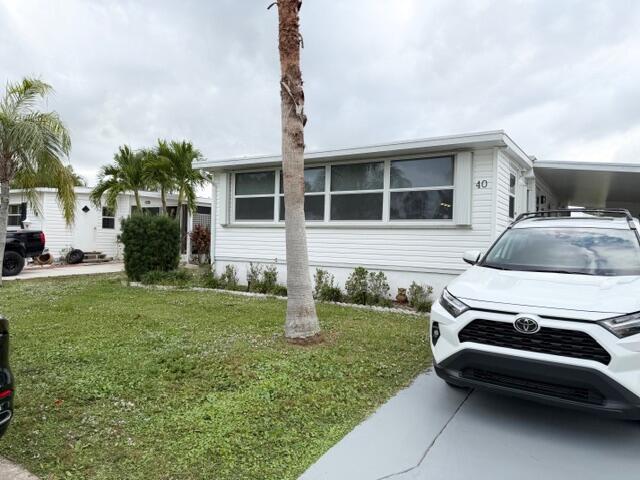Discover easy Florida living in this charming mobile home nestled within the sought-after 55+ community of Spanish Lakes One. The home boasts vinyl flooring throughout and a thoughtfully updated kitchen complete with new appliances, modern backsplash, and generous storage. Offering 3 bedrooms and 2.5 bathrooms, there's plenty of room for visitors alike. Whether you're relaxing or entertaining, this home delivers comfort and convenience. Schedule your private showing and start living the Florida lifestyle today.