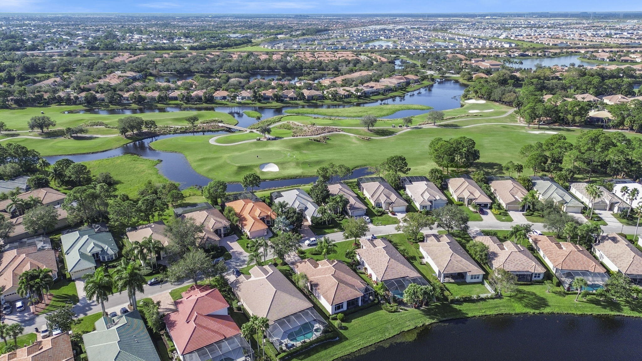 Beautifully designed and ideally situated on the lake, this 2-bedroom plus den, 2.5-bath residence is located in the sought-after Kingsmill at PGA community of St. Lucie. The flexible den offers endless possibilities—perfect as a third bedroom, home office, or private retreat to suit your lifestyle. Expansive windows capture tranquil lake views and bathe the home in natural light, creating an inviting atmosphere that blends indoor comfort with outdoor serenity. The open-concept living and dining areas are ideal for both everyday living and entertaining. The gourmet kitchen features modern appliances, ample counter space, and a breakfast bar for casual meals. The spacious primary suite provides a peaceful escape with a spa-inspired en-suite bath and a large walk-in closet. A generously sized second bedroom comfortably accommodates guests. Additional highlights include a two-car garage, abundant storage, and a private patio overlooking the sparkling lake.

Accordion shutters offer added security and storm protection. Residents enjoy access to resort-style amenities, including championship golf, a community pool, recreation center, and moredelivering the ultimate Florida lifestyle.