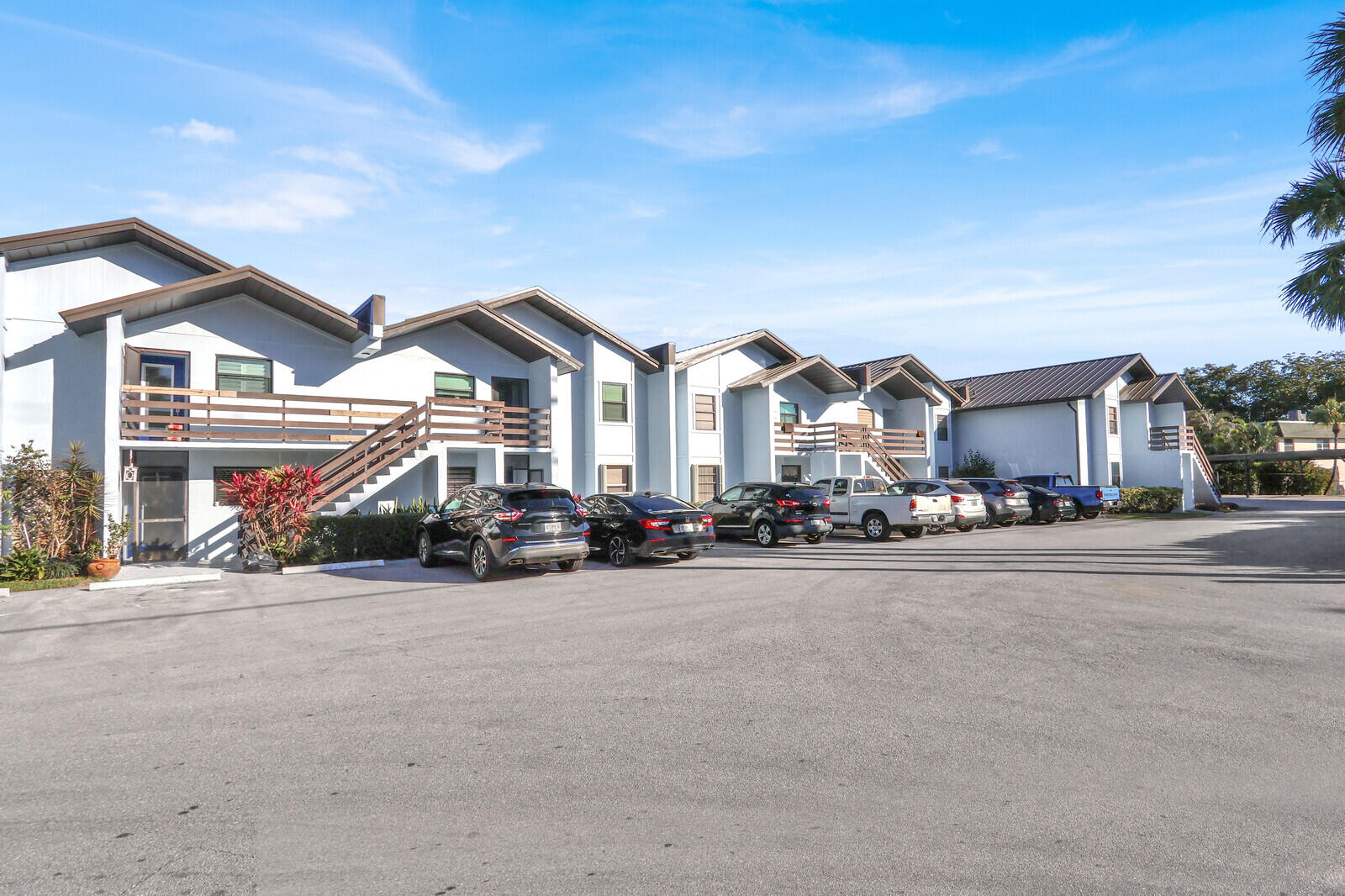 Welcome to this beautifully maintained first-floor unit, offering a desirable split-bedroom floor plan that provides both privacy and effortless flow. Bathed in natural light, this unit feels bright and welcoming throughout. Some major updates that will bring peace of mind include a newer roof and a recently updated air conditioning system (2022), fresh paint, stainless appliances, light fixtures and all new  flooring throughout allowing you to move right in and enjoy. The association enhances the lock-and-leave lifestyle by covering water, cable, exterior insurance, and trash services, covered parking and a community pool. Rental restrictions for the first two years help preserve the community's residential feel, making this an excellent option for primary living or a future investment.