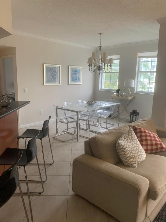 Fabulous 3 Bedroom /2 bath +Den in Village by the Bay!! Water views from every room. Spacious open layout with carpet and freshly painted. Amenities include clubhouse, pool, tennis court and fitness room. Near all of the shopping and restaurants in Aventura! Great Location !!! Ask about short term rentals and Pets A must see!!