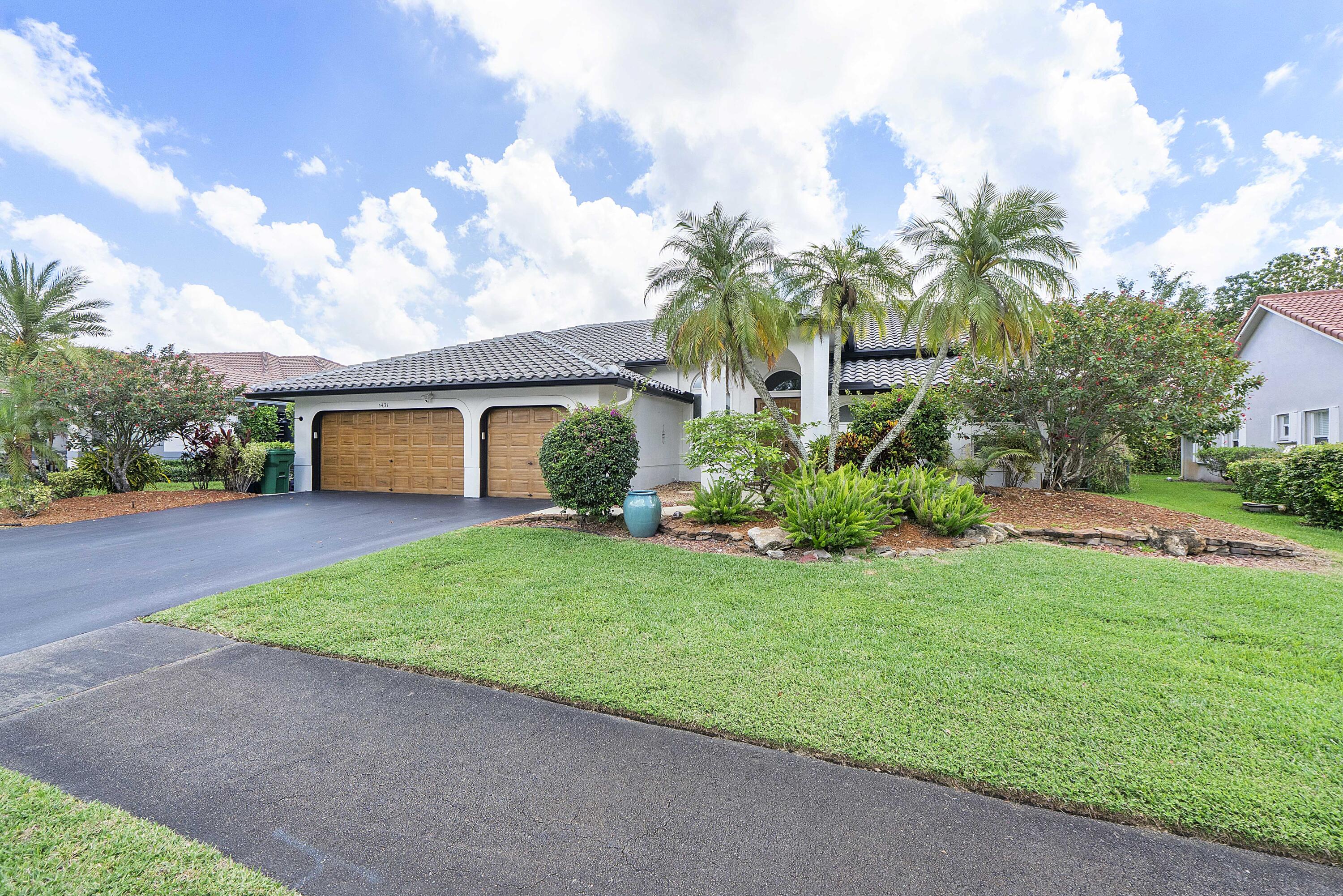 Stunning 4BR/3BA home with 3-car garage located in the desirable Kensington Commons community in NW Coral Springs. This spacious home features a triple-split floor plan, soaring ceilings, and an open layout filled with natural light. Oversized living areas overlook a resort-style backyard with pool, waterfall feature, travertine patio, privacy hedges, and fenced yard. Beautifully landscaped and conveniently located near parks, shopping, dining, and A-rated schools. Don't miss this exceptional rental opportunity. Schedule your private showing today.