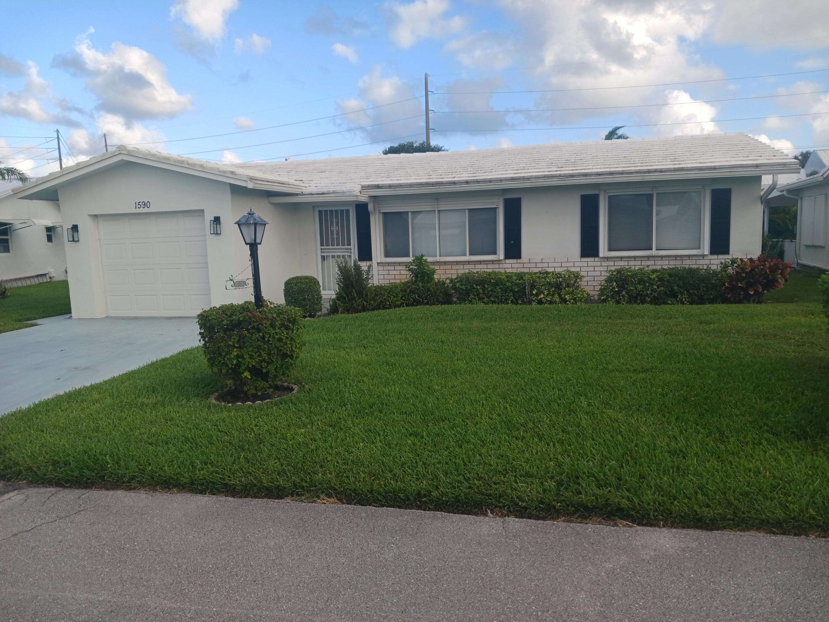 Fall in love with this charming, completely remodeled 2-bedroom, 2-bathroom canalfront home in the sought-after adult community of Leisureville. Waterfront with views of the L-26 and E4 canal. The spacious open floor plan invites natural light, creating a bright atmosphere ideal for relaxation and entertainment. The modern kitchen, with ample storage and contemporary appliances, hurricane shutters included, while the screen-enclosed patio offers serene canal views. Leisureville amenities include three clubhouses, three pools, a fitness center, free golf, and various social clubs and activities. Well maintained Roof 2016, HVAC 2019 and water heater 2019. 3 clubhouses pools, saunas and FREE 18-hole golf. Make this dream home yours