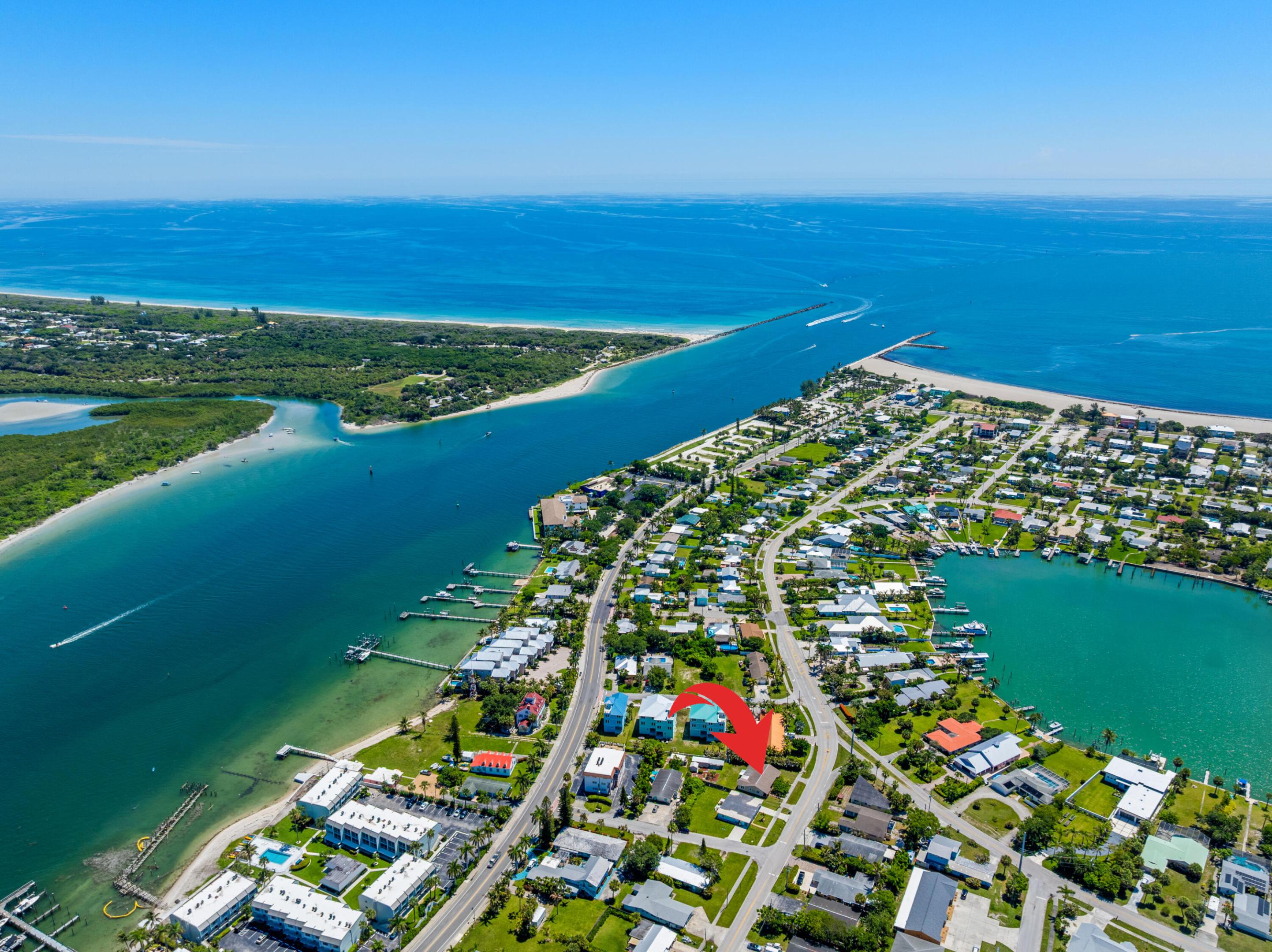 Rare coastal opportunity at the gateway to North Hutchinson Island—just minutes from the beach! Situated on nearly 1/4 acre with no HOA, this versatile property features two separate 2BR/1BA living spaces with impact windows, ideal for multigenerational living, guests, or income potential. Explore short-, mid-, or long-term rental strategies, renovate, reimagine, or consider future redevelopment. Ample room for boats, RVs, trailers, and beach toys, plus two storage sheds. Near Jetty Park, the Fort Pierce Inlet, marinas, fishing, boating, and waterfront favorites including Square Grouper Tiki Bar and Manatee Island. Live, vacation, or invest in this sought-after Treasure Coast location!