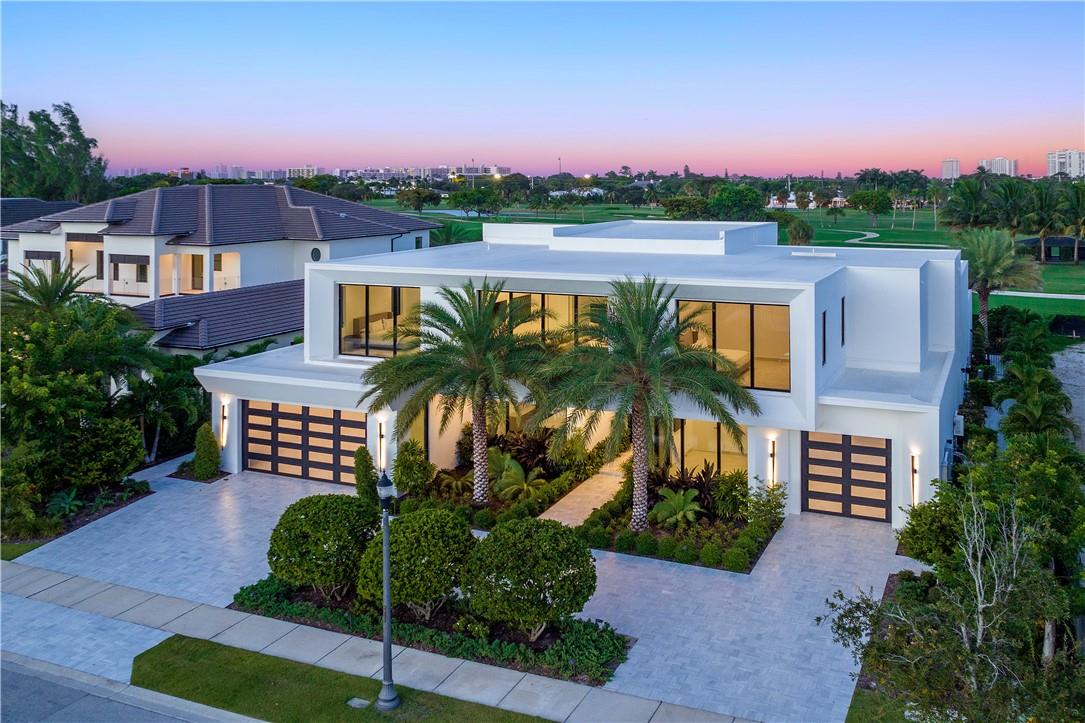 Breathtaking, Modern and Elegant, New Construction Estate in the Gated Golfing Community, The Enclave of Coral Ridge Country Club.  This home, designed by Architect Bruce Celinsky, boasts 7,490 SF of living space and sits on an oversized 17,000 sqft lot with stunning direct golf course views. Inside you will find soaring 24' ceilings, chef's kitchen with double islands, prep kitchen & pantry, main floor primary suite, 2 indoor fireplaces, upstairs media room with full kitchen, 7 car air conditioned & porcelain tiled garages, outdoor kitchen and custom pool & spa with fire & water features. This fully equipped smart home also comes with Sonos for Music, Lutron Lighting and Aqualink for the pool and spa. Home offered fully furnished with luxury Artefacto furniture.