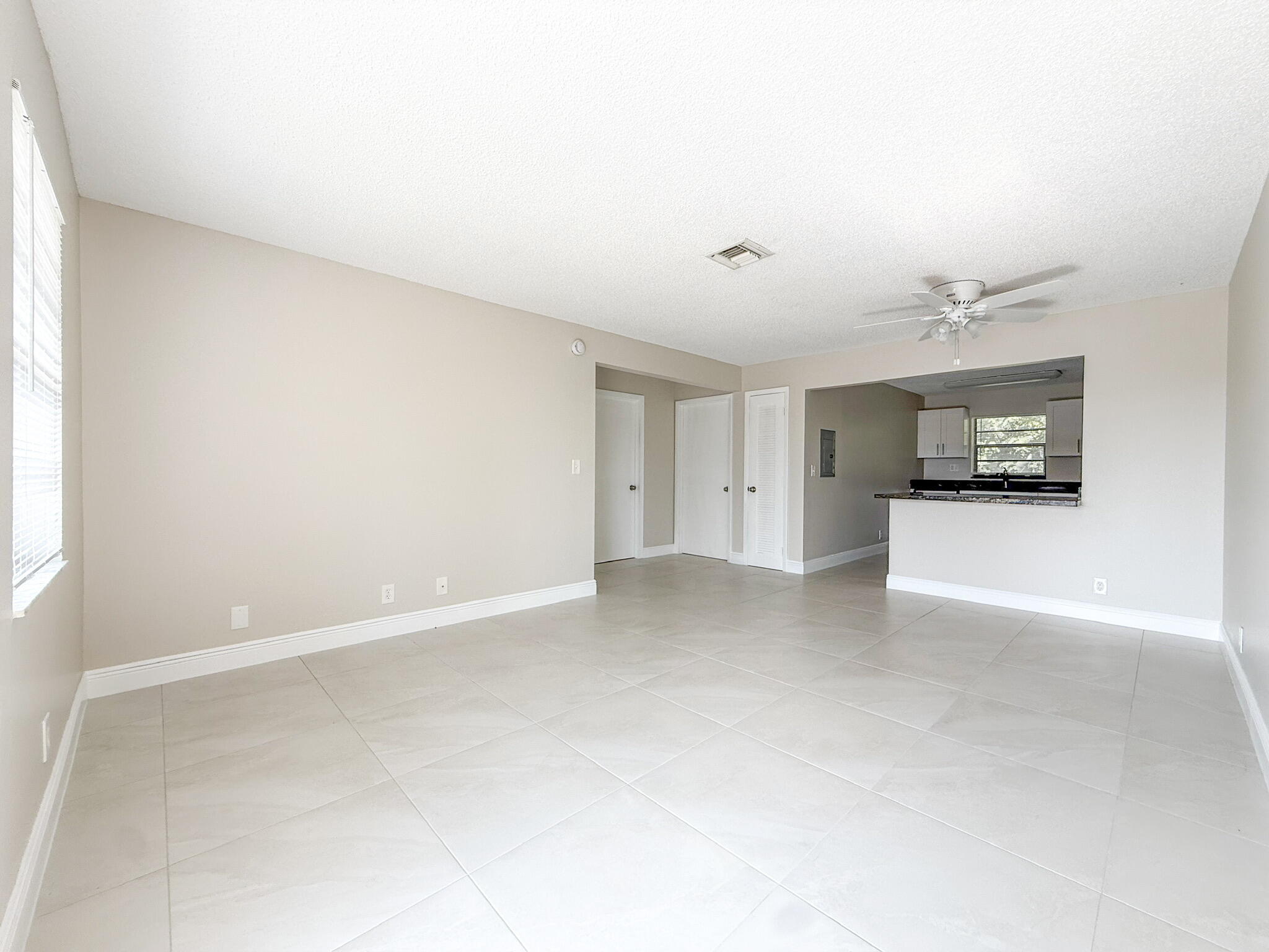 Step inside this 2nd Floor Walk up - 2 bed / 1 bath unit with tile throughout, freshly painted and a comfortable feel. This building has 9 units with a common laundry room and unit storage. ONE assigned parking spots for each unit along with guest parking. Nestled in the heart of Lake Worth Beach, you are surrounded by all the finest things life has to offer. Amazing landlord who cares about his tenants. First, last and security. WATER INCLUDED!