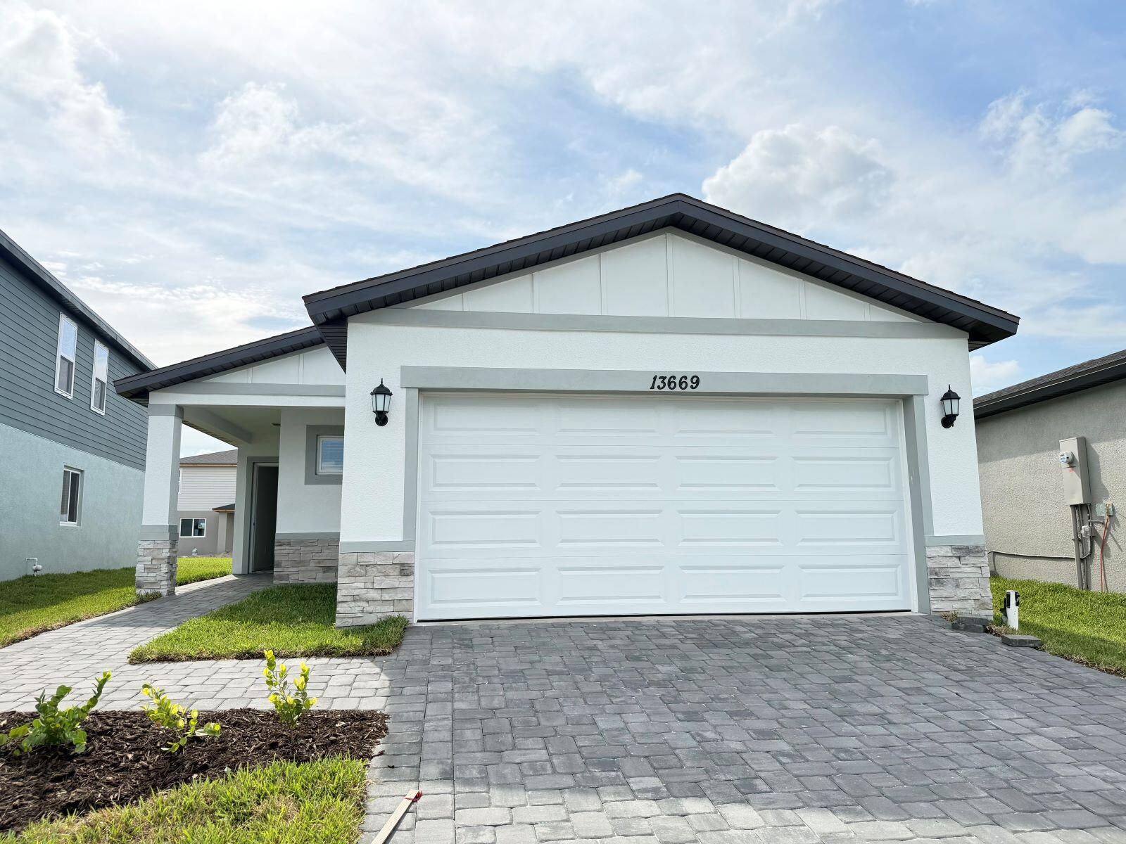Available now! 60 day closing ready guarantee! Builder incentives! 1,607 sq ft of energy-efficient living with 4 bedrooms and 2 baths in a smart single-story layout. Enjoy an open-concept design featuring a spacious kitchen, dining area, and great room—ideal for entertaining. Upgrades include all appliances, window blinds, smart home technology, and quartz countertops!The private primary suite includes a walk-in closet and ensuite bath, while three additional bedrooms offer flexibility for guests or a home office. Located in Terra Lago, a new community with resort-style amenities including a clubhouse, pool, and walking trails. Conveniently situated near both Martin and Palm Beach County, Terra Lago blends small-town charm with modern living.
