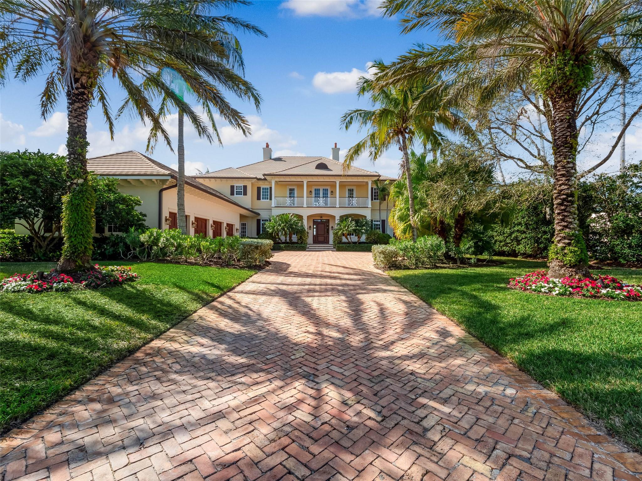 Expansive, southerly intracoastal views in this one-of-a-kind Estate Home.  This custom home boasts 6 bedrooms, 8.5 bathrooms, elevator, media room, recreation room and two primary suites .  Unparalleled custom millwork adorns every room including crown molding, base molding, cabinetry and coffered ceilings. The exterior features 110 sq ft of waterfront with boat lift and over 2500 sq ft of covered outdoor living space.An impressive pool and spa, with large patio and outdoor kitchen, create a resort-like environment.  You will not find another home like this in Vero Beach, with lush manicured gardens, incredible sunsets a sun-drenched interior and Private Beach access. This is truly an exquisite living experience. Features:Whole house generatorGarage accommodating 6 VehiclesElevatorTwo laundry roomsTwo DishwashersThree RefrigeratorsSix Wine RefrigeratorsOutdoor Kitchen