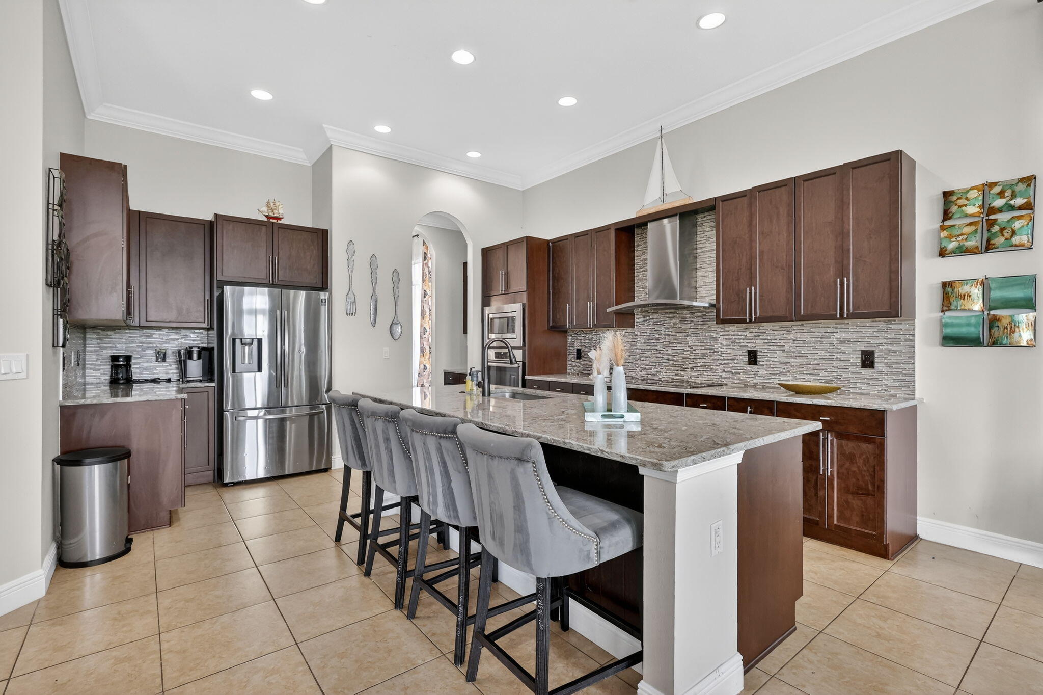 HUGE Price reduction.  Looking for a big house in the best community in Port St Lucie?  Don't miss this large home on the C-24 canal.  Luxury living in PGA Verano! This stunning 2019 Kolter-built home offers 4 bedrooms and 4.5 baths with serene views overlooking the C24 canal. Designed for both comfort and elegance, this home is nestled in a prestigious guard-gated community featuring resort-style amenities including golf, tennis, pickleball, and a grand clubhouse. Enjoy wide golf cart-friendly roads, sidewalks, and beautifully lit streets. Experience upscale living at its finest in one of the area's most sought-after communities!