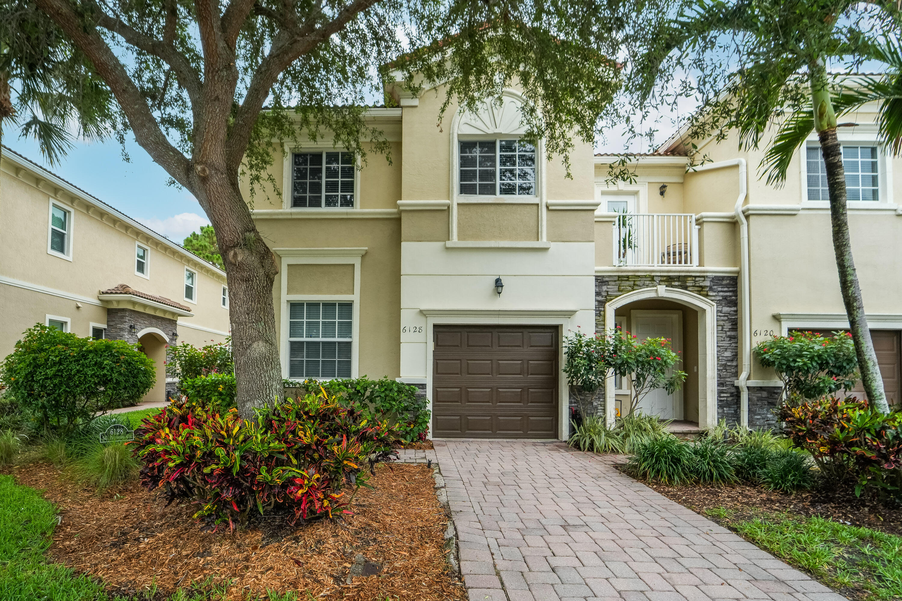 Welcome to this charming and very Well-Kept townhouse in Heritage Enclave, Hobe Sound, offering spacious waterfront living in a two-story residence. This 1,905 square-foot home features four bedrooms and three full bathrooms, providing ample space and comfort for modern living. The thoughtful layout spans two levels, maximizing efficiency and functionality throughout. A single-car garage provides convenient parking and storage. Situated in the desirable hidden away Heritage Enclave community, this waterfront townhouse presents an excellent opportunity for those seeking Florida coastal living. Very close to all convenience needs and just a BIKE ride away to the BEACH and Public BOAT RAMP.  END UNIT.. Care Free living! HOA covers everything exterior including roof replacement.  OWNER OCCUPIED WITH 3 LARGE DOGS. SCHEDULED SHOWINGS ONLY.