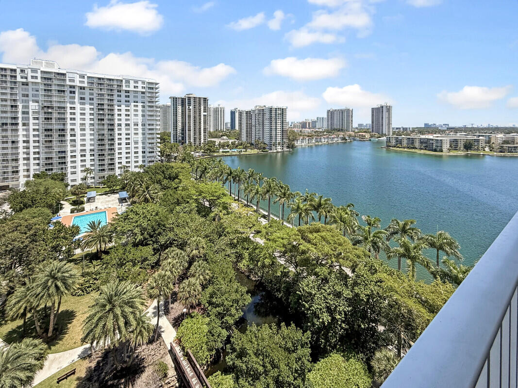 Experience Resort-Style Living in the Heart of Aventura!  Discover this spectacular, light-filled residence on the 12th floor (Unit 1212W) of the highly sought-after Admiral's Port West. This spacious property offers breathtaking panoramic views that capture the very best of South Florida. Enjoy the cross breeze from your expansive private balcony as you take in sweeping vistas of the Intracoastal Waterway, Maule Lake, and stunning sunsets over the city skyline.
