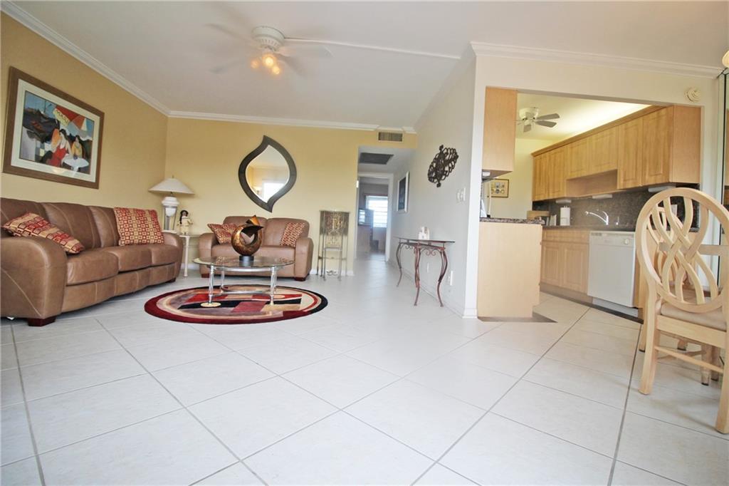 WATERVIEW, 4TH FLOOR & FULLY FURNISHED!! YOU WILL LOVE THIS 2 BEDROOM, 1.5 BATH WITH UPDATED KITCHEN & BATHS!! CERAMIC TILE & CROWN MOLDING IN LIVING & DINING AREAS! THE KITCHEN FEATURES DOUBLE SINK, GRANITE COUNTERTOPS & BACKSPLASH! A/C & HWH JUST 1.5 YEARS OLD! THE ENSUITE BATHROOM HAS A LOVELY WALK IN SHOWER WITH TILED WALLS & GLASS SHOWER DOOR! NO POPCORN CEILINGS HERE!! ENJOY THE 4TH FLOOR VIEW OVERLOOKING THE WATER FROM THE ENCLOSED PATIO W/ TILE FLOORS! THIS IS A NON RENTAL BUILDING WITH A 650 MINIMUM CREDIT SCORE! CENTURY VILLAGE EAST IS A GUARD GATED COMMUNITY W/ A FABULOUS CLUBHOUSE OFFERING A STATE OF THE ART GYM, 1,500 SEAT THEATER AND CLUBS GALORE!! SITUATED LESS THAN 4 MILES FROM SOUTH FLORIDA'S MOST BEAUTIFUL BEACHES! YOU'LL LOVE THIS PLACE! ASSOCIATION CLAIMS 55+