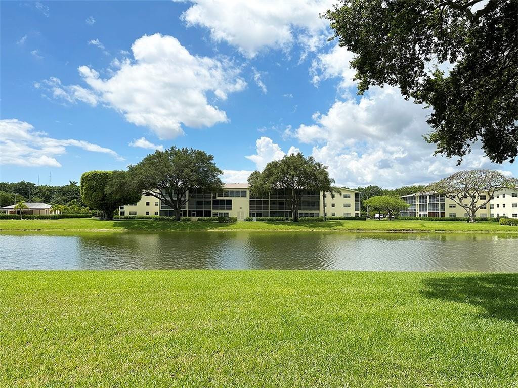 This 1 bedroom / 1.5 bathroom overlooking the lake in the 55+ community of Century Village, located on the 3rd floor. This unit has laminate floors throughout living space. Offering central AC and plenty of closet and storage space throughout. Century Village is a gated resort-style community offering a wealth of amenities, including a fitness center, sports courts, a swimming pool, live shows, movies, buses, classes, bingo, card rooms, trips, and more! Conveniently located in Boca Raton close to dining, golf, shopping, and the Town Center Mall.