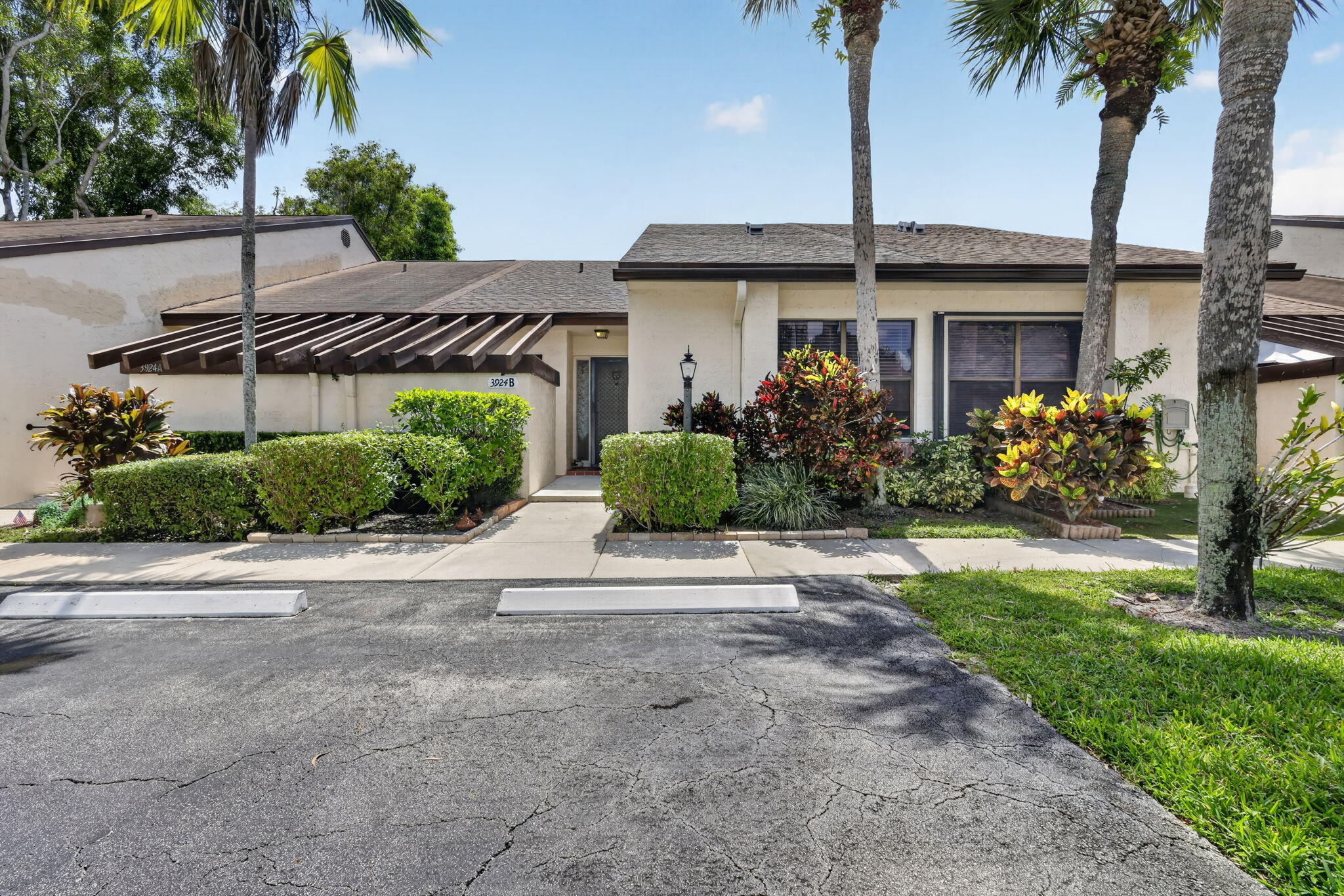 Welcome to this 2 bedroom, 2 bathroom villa located in the highly desirable 55+ community of Villas of Willow Bend. This home is the perfect opportunity for a buyer to renovate and create their dream home. Major updates have already been completed, including a new roof (2024) and A/C (2023), providing a great foundation for your vision. Residents of Villas of Willow Bend enjoy an active lifestyle with an impressive selection of amenities, including two swimming pools, two clubhouses, tennis courts, shuffleboard, and more. Conveniently located near shopping, dining, and everyday conveniences, this home is also approximately 7 miles from the beautiful South Florida beaches.