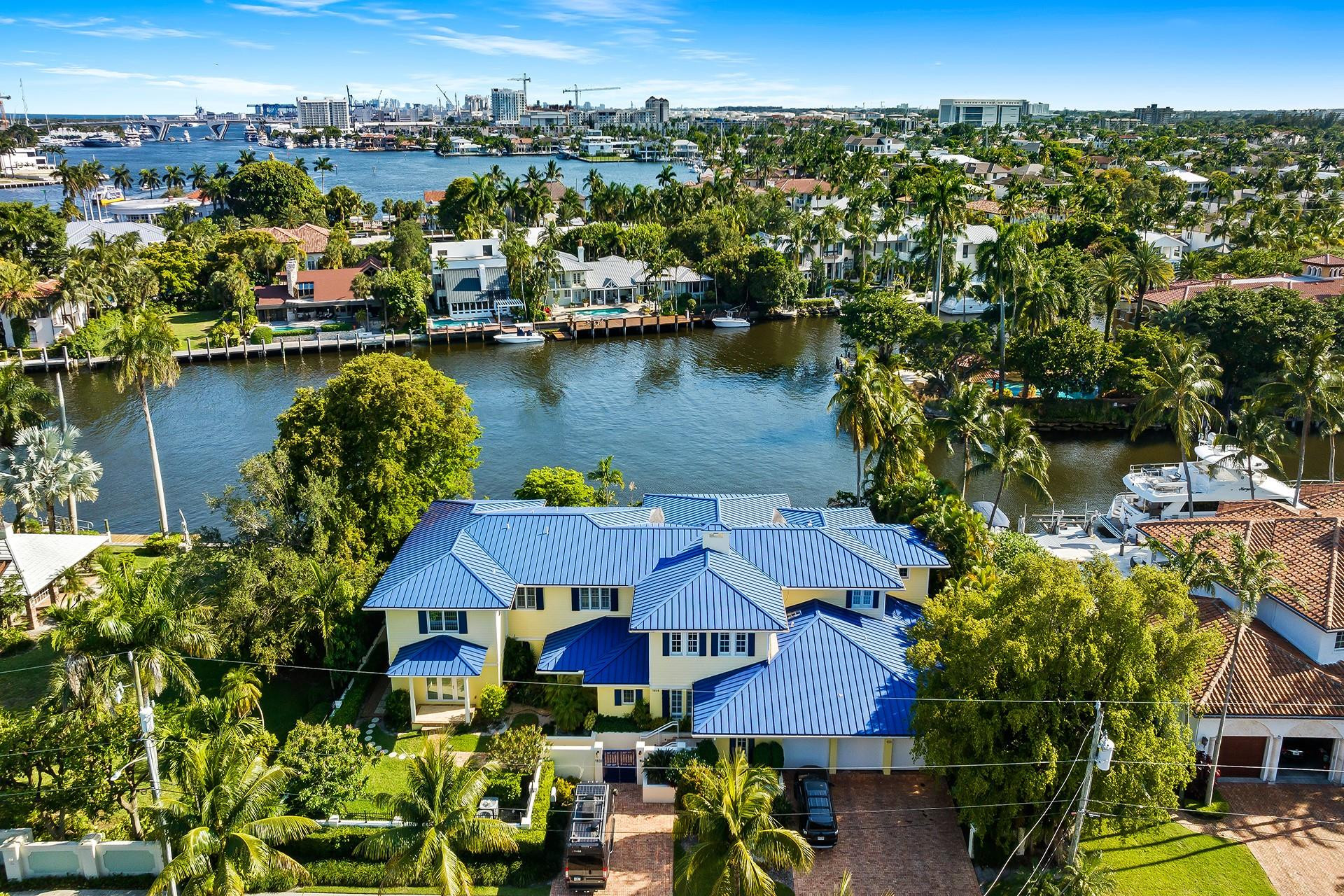 Fabulous home in Rio Vista Isles - Come live on coveted 7th Street  - This home sits on an almost 17000 sq ft lot with 135' of prime waterfrontage and a 300' turning basin for ease in docking your yacht- The wide basin makes you feel like you are on your own private island - The property is the second home from the intercoastal waterway making it an easy in and out with only minutes to the ocean.The home features 6 ensuite bedrooms, full gym with sauna, and a movie room!