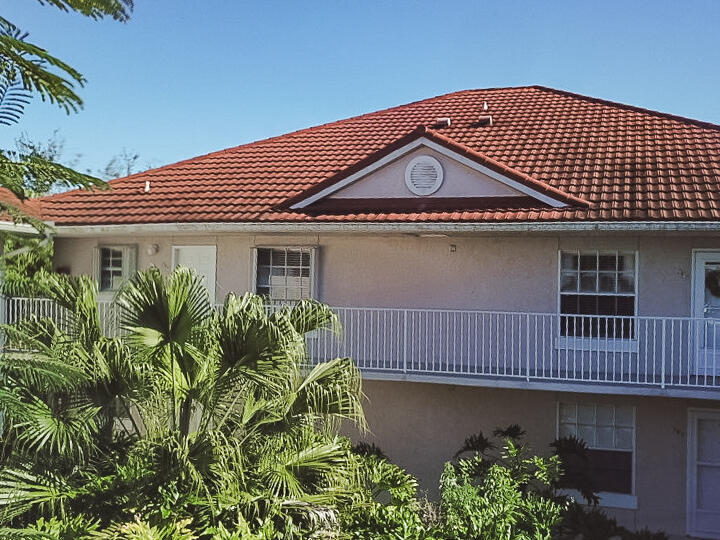 **INVESTOR SPECIAL**All age community. 2nd floor unit with pond water views. New AC February 2025.New washer and dryer may 2026.  Minutes to the beach, restaurant and shopping. Community clubhouse. 2 bedroom 2 bath. Updated kitchen with granite countertops and newer appliances. In kitchen breakfast nook. Outdoor covered/screened patio.