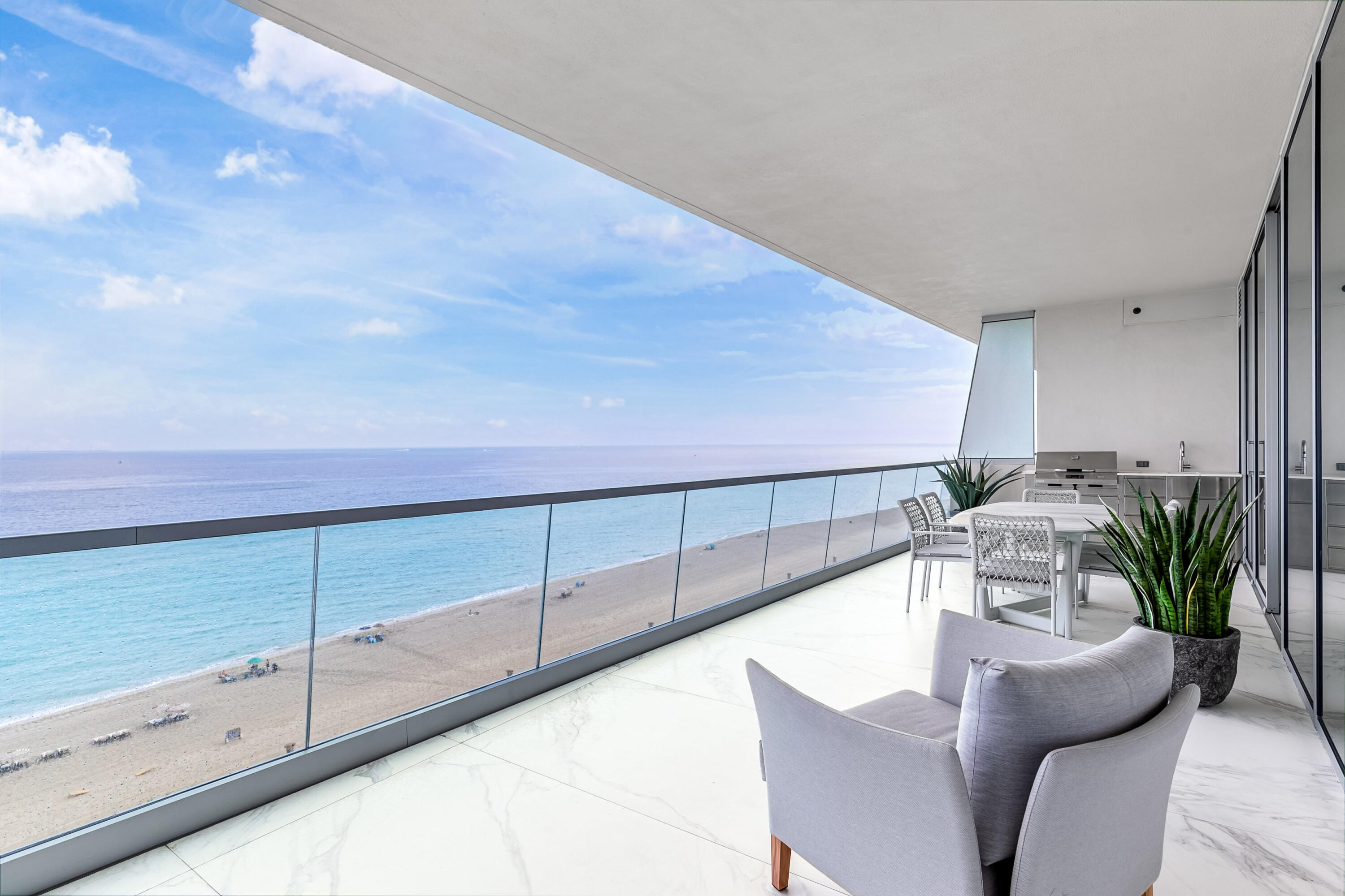 This stunning beachfront corner residence with a modern flair, offers a luxury lifestyle overlooking the beautiful Atlantic Ocean and Intracoastal Waterway. Featuring a magnificent chefs kitchen with top of the line appliances and finishes, a large owner's suite with two walk in closets, a very spacious living area that flows nicely out to an oversized balcony with true privacy, several guests rooms, maids quarters and a private elevator access taking you directly to your foyer.  Turnberry Ocean Club Residence offers 70,000 sq. ft. of luxurious amenities and world class services.  This home is a must see to experience the ultimate in Miami lifestyle.