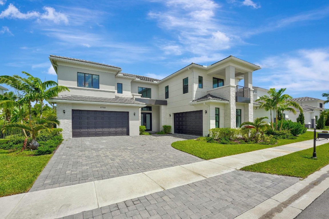 Step inside to this Brand NEW Never lived in 2024 Cosenza model home. Dramatic 2 story entryway with grand double staircase. 5 beds, 5.2 baths, office, club room & media room. Most impressive, oversized primary suite in the community, with private sitting area, balcony overlooking the pool and garden, custom his & her closets, sparkling bathroom with dual vanities, soaking tub & rain shower. Chef's kitchen with walk-in pantry, top of the line appliances including gas stove & 2 wine fridges, custom black marble island, open to extra large breakfast area & family room. Sliding glass doors lead to the covered lanai ready for summer kitchen. Heated saltwater pool with sunshelf & submersed jacuzzi. Prestigious gated community with no membership and private community resort style amenities.