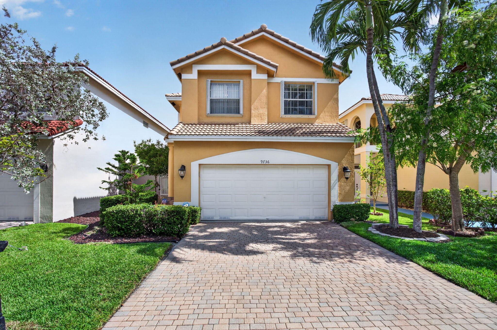 Beautifully updated two-story home with a newer roof installed in 2021, located in a desirable Coral Springs neighborhood with peaceful water views. This bright and inviting residence features an open layout, updated flooring, neutral finishes, recessed lighting, and spacious living areas. The renovated kitchen offers white cabinetry, sleek countertops, stainless steel appliances, and a stylish backsplash. Enjoy Florida living from the large paver patio overlooking the water, surrounded by mature landscaping for added privacy. Additional features include updated bathrooms, an interior laundry room, and a spacious two-car garage with epoxy-style flooring and excellent storage cabinetry. Conveniently located near shopping, dining, parks, schools, and major roadways.