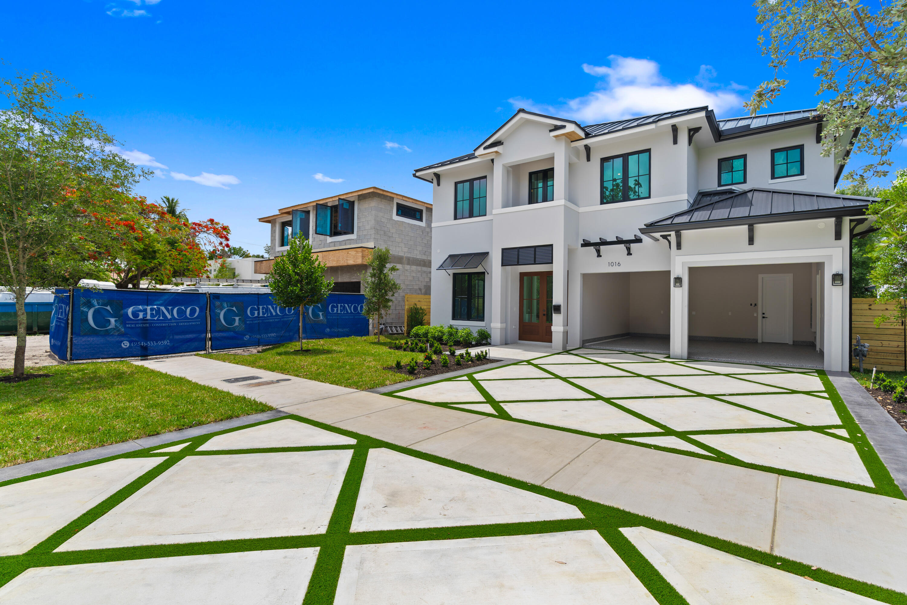 Experience sophisticated new coastal contemporary construction by GENCO in the highly desirable Rio Vista neighborhood. This 5-bedroom, 5 full bath, 1 half bath residence offers 3,907 sq ft of luxury living with clean architectural lines and designer finishes throughout. The chef's kitchen is designed for entertaining with double islands, JennAir appliances, custom cabinetry and a dedicated coffee bar. Expansive living spaces open seamlessly to a resort-style backyard featuring a pool, covered patio and summer kitchen. Upstairs lounge with refreshment center. The spacious primary suite includes a private balcony overlooking the pool, spa-inspired bath and oversized walk-in closets. Metal roof, 2-car garage and exceptional attention to detail throughout.