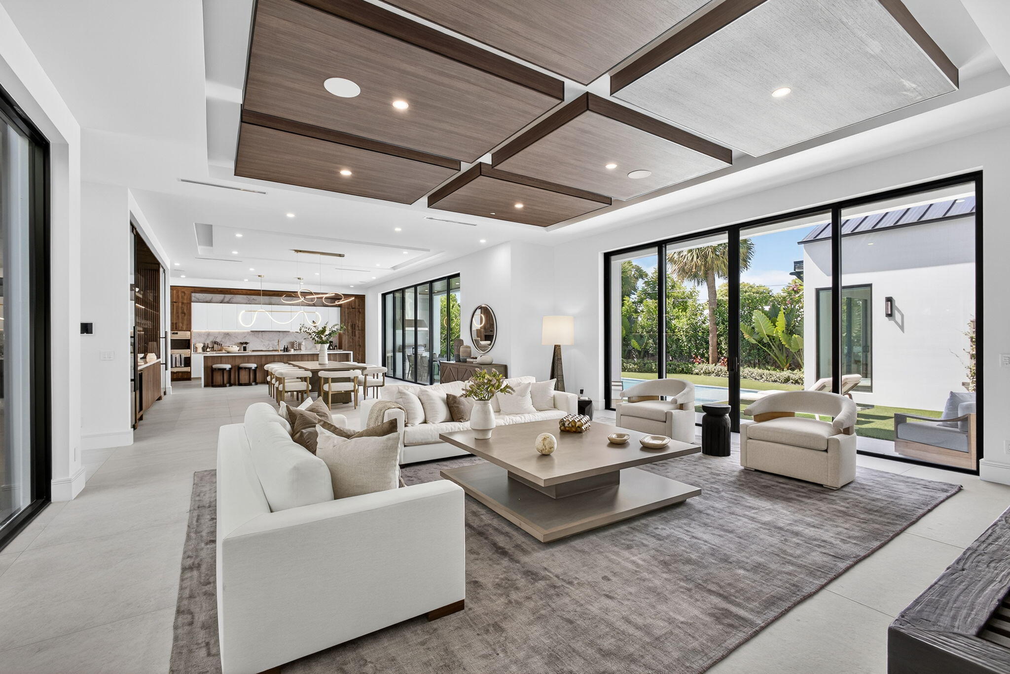 Welcome to West Palm Beach Living at its finest! This beautifully designed 5-bedroom home, plus a detached guest house that serves as a 6th bedroom, offers space, style, and unbeatable convenience. Designed with modern finishes and fully furnished for immediate move-in, the property features an open-concept layout, sleek kitchen with a gas range, oversized island with a breakfast bar, a wet bar and spacious bedrooms perfect for families or groups. Stunning views of the Intracoastal and Palm Beach Island. Step outside to your private backyard oasis, complete with a sparkling gas heated pool, built in grill, and plenty of space to relax or entertain. Enjoy a lovely al-fresco dining area. The separate guest house provides additional privacy for visitors or remote work needs.' The guest house also features a cabana bath with a separate entrance. Wake up in the morning and open the sliders to the large, covered balcony in the primary bedroom. Huge his and her walk-in closets and a stunning bathroom with a walk-in shower and separate tub. The 3rd bedroom features an open balcony with Intracoastal views. All of the bedrooms in the home have large, custom built in closets. Located steps from the Intracoastal, just minutes from downtown, fantastic restaurants, the beach, shopping, and Palm Beach International Airport, this home offers the perfect blend of luxury and location for a comfortable and connected lifestyle. Whether this is a second home or your primary residence, this is the perfect place to call home! Call for details and make an appointment to view this phenomenal home today!