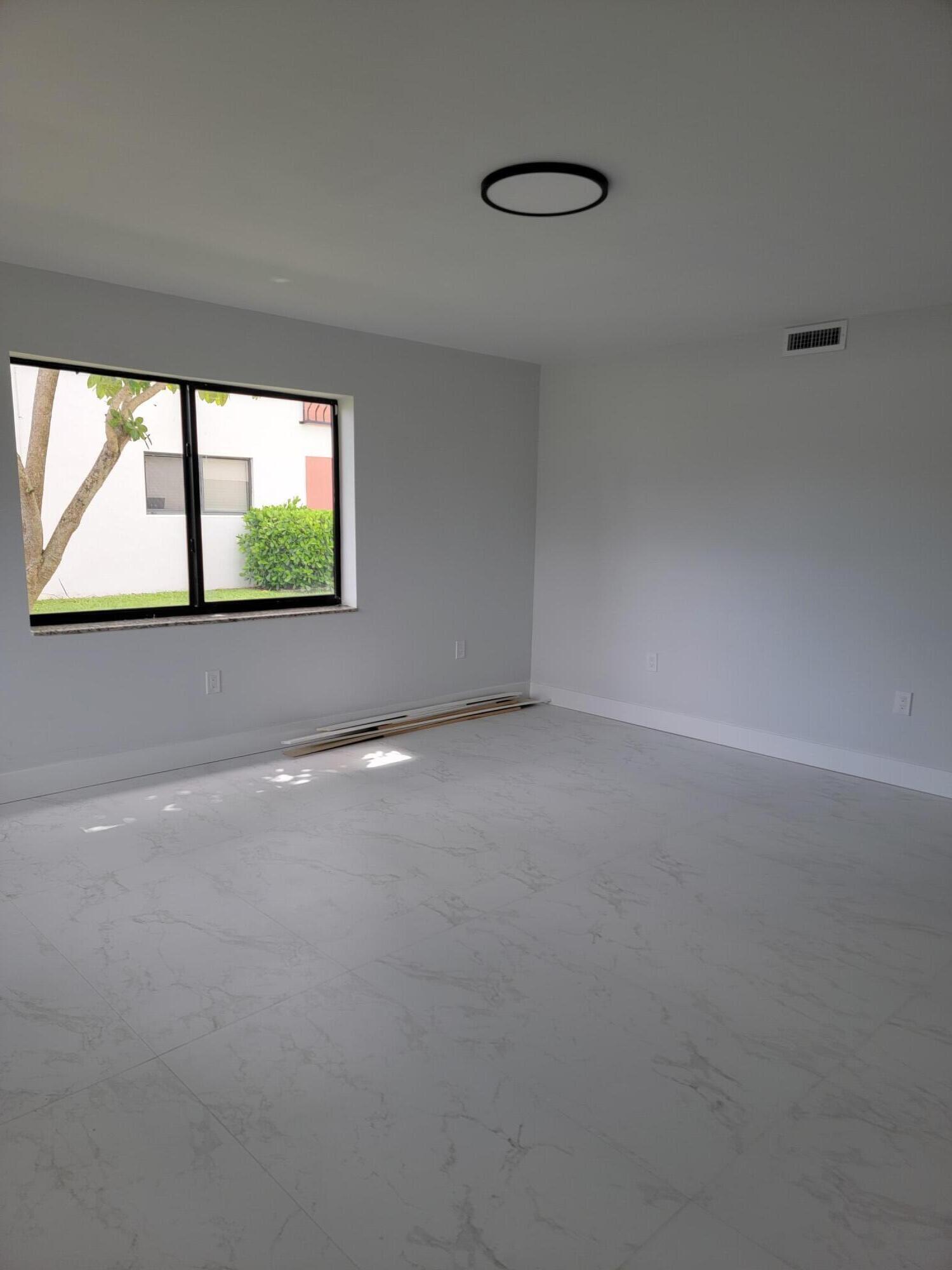 I am pleased to present this fully renovated, with new appliances, new A/C, washer and dryer in the Unit, three-bedroom, two-bathroom condominium in the Camino North Condo community of Boca Raton, Florida. This 1,140-square-foot residence features a thoughtful layout designed for both comfort and entertaining. Located in a prime area, the property offers easy access to local amenities and is just a short distance from the beach. This is an excellent opportunity for anyone seeking a modern home in the heart of Boca Raton. Please let me know if you would like to schedule a viewing or if you require additional information. Also for Rent MLS# B26047513. All appliances, blinds, and little finish will be completed by the owner before the move-in-date Also for rent