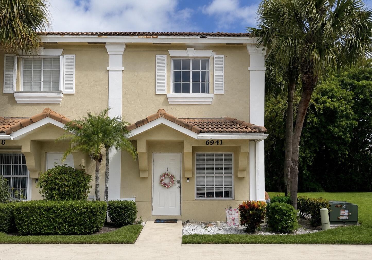 A wonderful opportunity awaits in the beautiful and desirable Smithbrook community. This bright corner-unit townhouse is adjacent to a cul-de-sac and features 2 bedrooms and 2.5 baths. Located in a gated, all-ages community, it offers abundant natural light, two parking spaces, and an A/C system that is less than 2 years old. Both upstairs bedrooms have their own private bath, while the downstairs half bath adds extra convenience for guests. The clubhouse offers a fitness center, pool, and hot tub, enhancing the appeal of this well-maintained neighborhood. Ideally located in a highly desirable Palm Beach County area, this home provides easy access to shopping, dining, and top-rated schools. This townhouse is ready for you to make it your own.