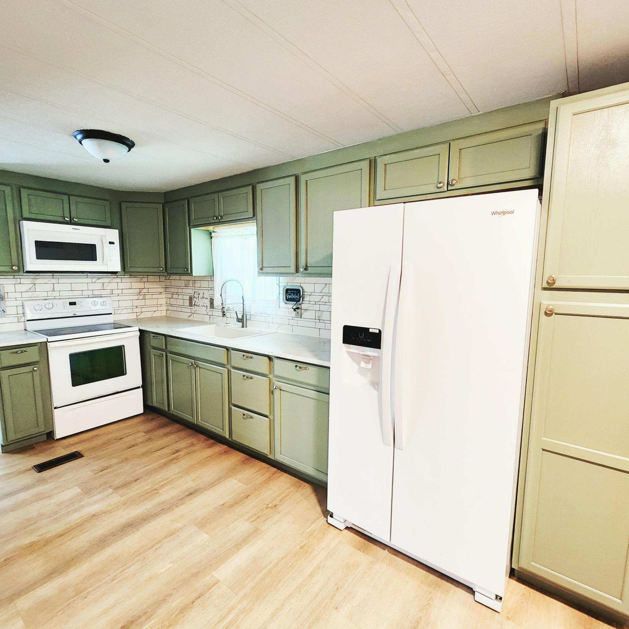DONT MISS OUT on this home w/ a Large Lot Great for Grilling, Gardening, Bird Watching, Dog Play & more! Unique 3bed/2bath w/ upgraded kitchen & appliances. Large storage SHED w/ Ample Yard Space - great privacy for activities. Beautiful, well lit, enclosed Patio/Florida Rm w/ AC doubles as an extra room/den/office & more! Master bedroom features an en-suite bathroom & all bedrooms offer generous closet space! PRIME LOCATION; close to the beach (but NO FLOODZONE), the mall, grocery stores, diners, coffee shops, post office, banks, pharmacy, hospitals & more. Lot lease 833.06 includes lawn care, trash, private, free golf course, heated pool, pickleball, tennis, shuffleboard, bocce, gym, library, cards, Mahjong, bible study, wood workshop, dinners, parades, dances & more!