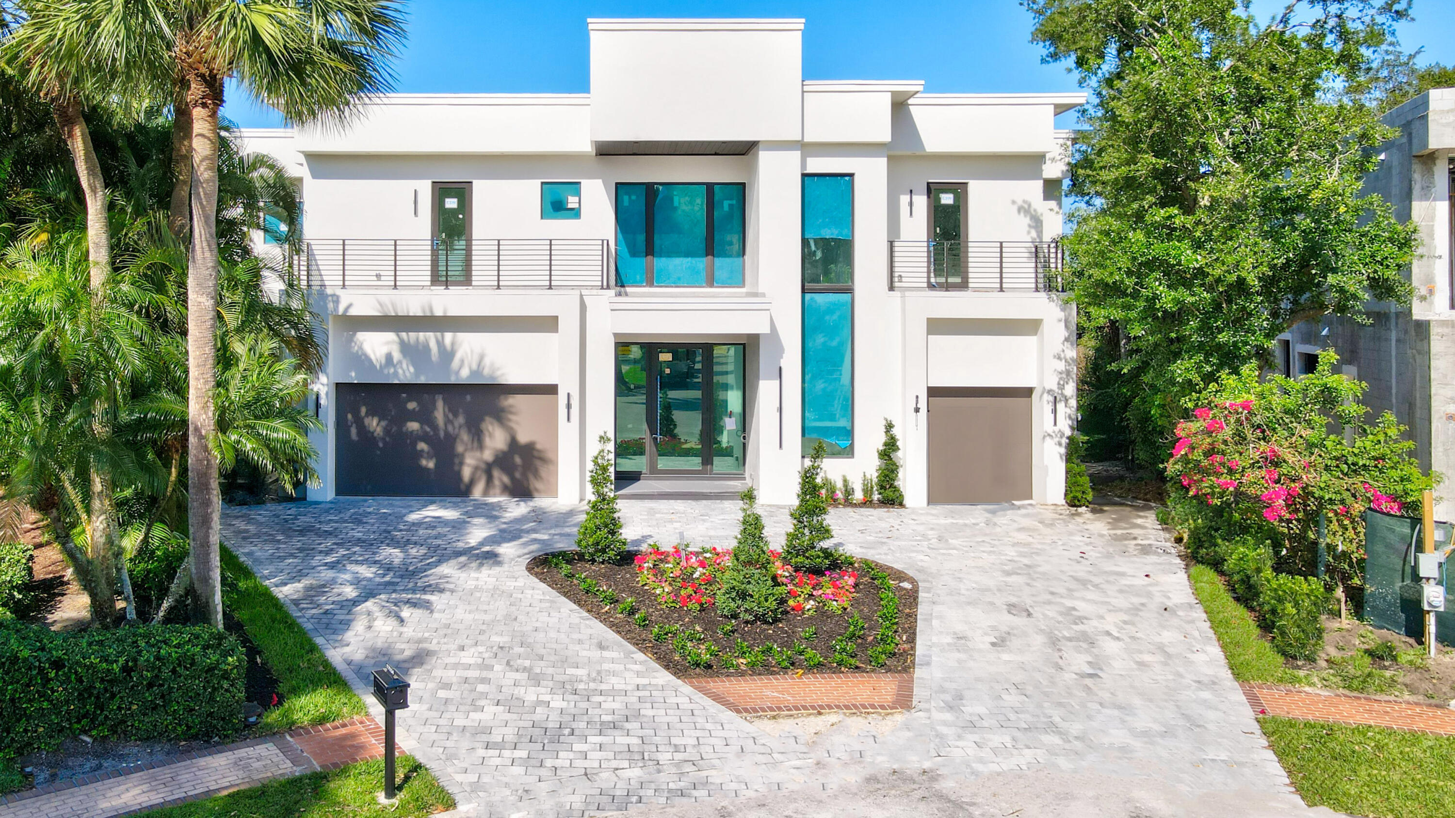 JUST COMPLETED  -  This New Modern Contemporary 5 bedroom two-story spec residence features a soaring two story foyer that opens to a great room, adjacent kitchen and dining area. A first floor primary suite with spacious dual bathrooms and walk-in closets, three car garage, powder room, elevator, pantry, mudroom, laundry, exterior office/gym and cabana, outdoor kitchen, outdoor covered dining area and covered lanai. A free floating staircase leads to the secondary level with dramatic look down views into the entry foyer and great room. Here there are four bedroom suites with full walk-in closets and bathrooms, two of which have walkout eastern front balconies, and a spacious family room medial area.   One of the best valued residences in St Andrews and all of Boca Raton. A full-size family room (with a full 6th bathroom)  can also be used as an entertainment/game/or media room below or closed off as a private room. A loft area off the staircase, elevator and secondary laundry room complete the second floor.  The exterior of the residence, built on .41 of one acre tropically landscaped paradise, allows for a private full size open pool, a cascading waterfall spa, and an open patio area. The Large southern portion of the property is reserved for a play area and golf putting green.  



SUBJECT TO CHANGES, DELETIONS, ADDITIONS AND MODIFICATIONS.  
THE REPRESENTATION OF APPLIANCES ARE MEANT FOR THOSE PHYSICALLY ONSITE AT THE RESIDENCE
A FULL MEMBERSHIP TO ST ANDREWS COUNTRY CLUB IS REQUIRED AT CLOSING.  

Thermador Kitchen Package- Stainless Steel
- 36" Freezerless Refrigerator
- 30" Upright Freezer
- 48" 6 Burner Gas Range
- Wall Mount Range Hood with Blower
- Coffee System
- Single Electric Wall Oven
- 2- Single Electric Wall Oven
- 2- Warming Drawers
- Microwave Drawer
- 24" Wine Cooler
- 2- Built In Dishwashers

Liquid Propane System
- 1000 Gallon Underground Liquid Propane Gas Tank Used For Whole Home Generator System Along With Gas Range, Fireplace, BBQ, and Pool Heater. 

Whole Home Generator System
- 48KW Generac Generator: Model #RG04845

HVAC Systems
- 4- 5 Ton, 19 SEER RHEEM System
- 1- 4 Ton, 19 SEER RHEEM System

Windows and Doors
- Front Door- Marvin Coastline Outswing Double Entry Door. Model AM-5H with 6" Square Muntins, 84" x 144", 4" Stiles, 8" Bottom Rail, 4" Top Rail, Standard 1-3/4" Sill, Bronze Frame, Clear LO-E 366 9/16 Impact HS w/ SGP Interlayer Glass, Square Glazing Beads, Dark Bronze Hinges, Brushed Stainless Steel 60" Rectangular Offset Pulls. 
- Windows- Marvin Coastline Hurricane Impact Resistant Windows. Bronze Frames. 

Exterior Features
- Roof: Boral Saxony 900 Field Tile- Color: Dark Charcoal
- Driveway: Gem Pavers Old Canada- Color: Marble Slate
- Garage Doors: 4 Doors Total.  2- 18 x 8' Clopay 9208 W6: Charcoal. 2- 10' x 8' Clopay 9208 W8: Charcoal. 4 Lift Master Garage Door Openers. 

Steam Generator
- Mr. Steam 20KW MMX4EC1 Steam Generator For Master Shower